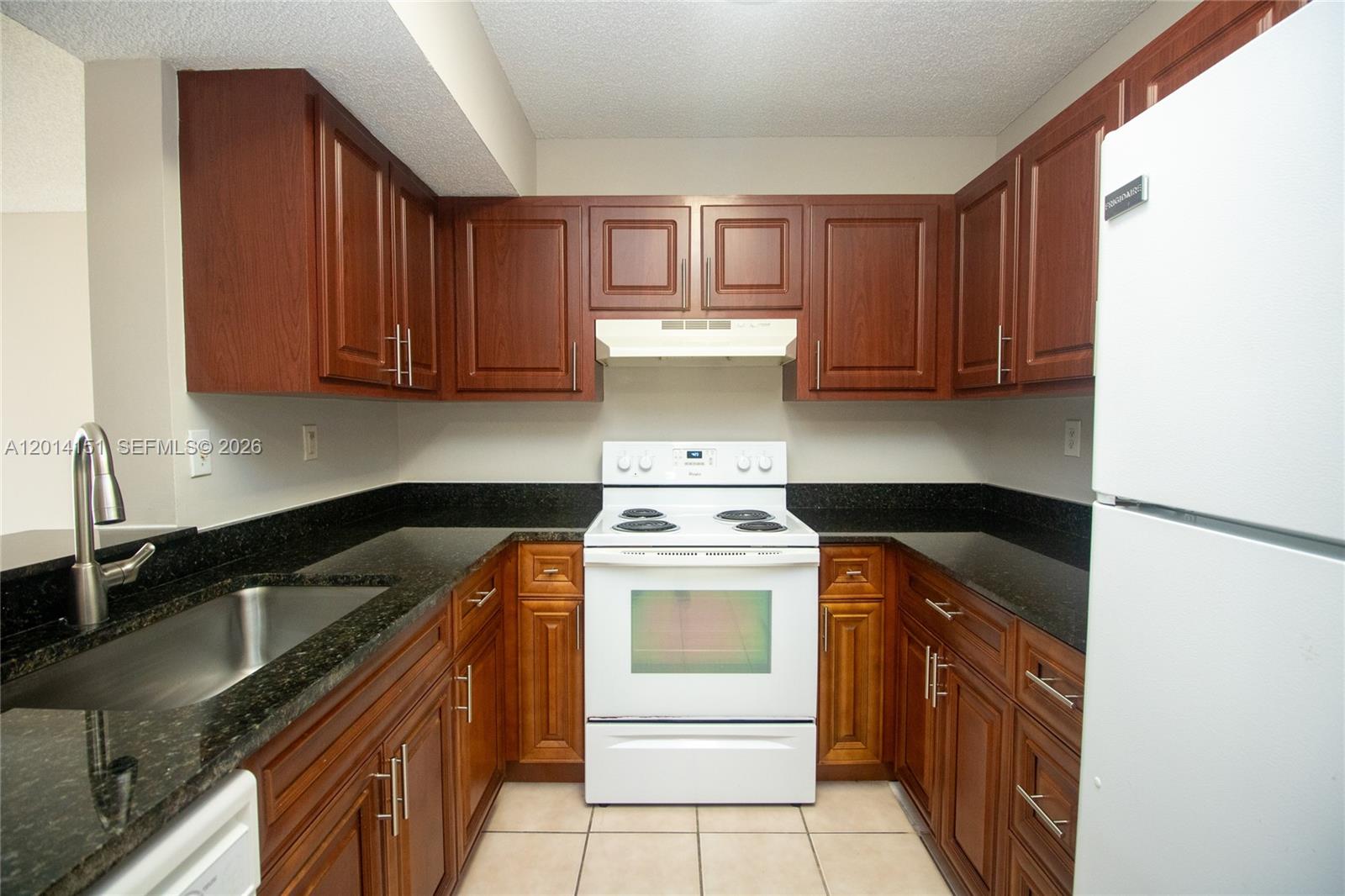 Ground-Floor Gem in the Heart of Pembroke Pines! Welcome to this bright and spacious 2-bedroom, 2-bathroom condo located in the beautifully maintained community of The Palms of Pembroke. This coveted first-floor unit features a welcoming open layout with seamless transitions between the living and dining areas—perfect for both relaxing and entertaining.

The primary suite serves as a true retreat, boasting a generous walk-in closet and an en-suite bath. Enjoy the convenience of an in-unit washer and dryer, neutral tile and laminate floors throughout for easy maintenance, and a private porch perfect for your morning coffee.

Residents of The Palms enjoy resort-style amenities, including a sparkling pool, fitness center, tennis courts, and a clubhouse. Strategically located just minutes from the Florida Turnpike and I-75, and a short drive to the premier shopping and dining at Pembroke Lakes Mall and Pembroke Gardens. Whether you are looking for a primary residence or a savvy investment opportunity, this unit is a must-see!