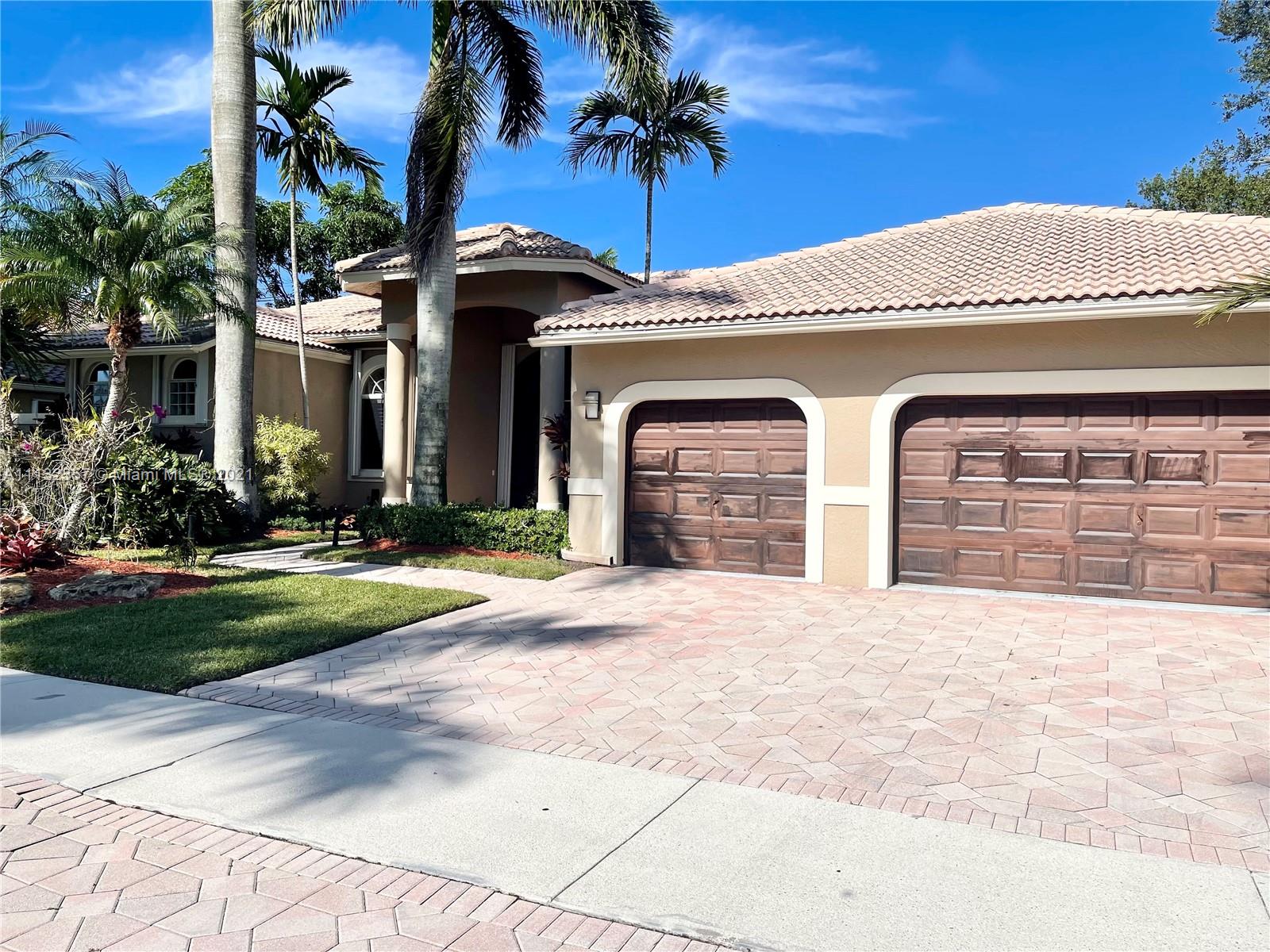Magnificent Weston Hills 1 story in much sought after Mayfair section. DOUBLE FAIRWAY-GOLF COURSE LOT with an amazing view! Double glass front entry doors lead to a huge living and dining room with high ceilings and crown moldings. Saturnia marble floors throughout the mail areas.  Lovely open kitchen with center island and wet bar. generous family room has surround sound.  Master suite has large walking closets with custom shelving and a newly redone bath. 6th bedroom is used as an office next to the master.  Large paver patio area. The house has complete accordion storm shutters.  This type of home rarely comes available for lease.  All prospective tenants must have excellent references and credit.  1st month's rent & 2 months security deposit mandatory plus $250 cleaning fee.