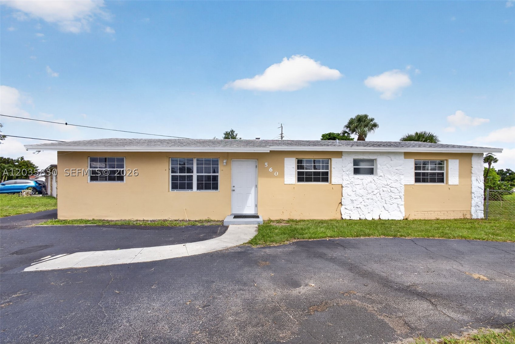 Your wait is over! Welcome to this beautifully renovated 4-bedroom, 2-bath home in sought-after Park Manor at Riviera Beach. This move-in-ready property offers an inviting floor plan with fresh interior and exterior paint, smooth ceilings, and new luxury vinyl plank flooring throughout. The remodeled kitchen features white shaker cabinetry, contemporary countertops, and GE appliances. The spacious primary suite includes a walk-in closet, while both baths have been updated with new vanities, elongated chair-height toilets, modern lighting and ceiling fans. Generous guest bedrooms, a utility room, and thoughtful upgrades throughout add comfort and convenience. Situated on a large southeast-facing corner lot, the property also offers an oversized multi-car circular driveway, fenced yard, concrete shed pad, and room for a pool. Ideally located near shopping, dining, schools, parks, beaches, city amenities, and the recreation center. Don’t miss this exceptional opportunity!