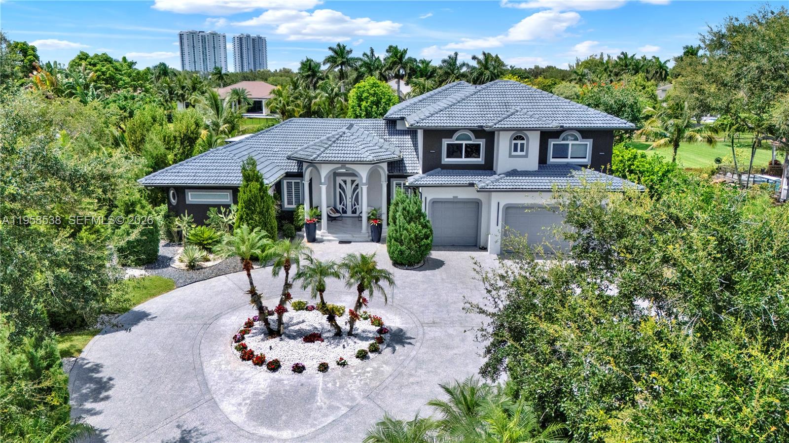 Welcome home to a sanctuary where luxury, nature, and artistry come together. More than a home… this is a lifestyle. A masterpiece designed to be lived, loved, and remembered.
Discover this fully renovated estate on a sprawling 36,788 sq ft gated lot, offering the perfect blend of privacy, elegance, and comfort. Sunlit open spaces with impact windows lead to an Italian chef’s kitchen, exquisite finishes, and a first-floor owner’s suite with his-and-hers closets and a spa-inspired bath. Step outside to two stylish pergolas, a summer kitchen, cabana bath, and a breathtaking heated saltwater infinity pool and spa framed by lush gardens and peaceful canal views. Circular driveway, 3-car garage, and no HOA. All this just minutes from top schools, Sawgrass Mills, golf, and equestrian trails. This is where luxury living becomes your everyday reality.