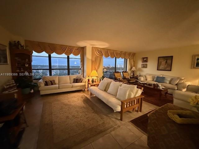 Welcome to resort-style living at Olympus in Three Islands. 2/2 AS PER TAX RECORDS
Set on 16 acres of beautifully landscaped grounds, this high-floor unit offers views of waterways, a park, a golf course, and the city skyline. 2/2 1400 SQ. FT. The second bedroom, FLEX ROOM, has been opened to maximize living space and can easily be converted back to a true second bedroom. Ample closet space throughout. Built-in cabinets and dresser drawers in the primary bathroom. Updated kitchen and tile floors throughout. The best feature is that hurricane shutters protect all windows.
Olympus Condo offers full security with a 24-hour doorman, two pools, a sauna, tennis courts, a marina, a BBQ area, covered parking, and a game room. Walking distance to the beach, restaurants, and shops. Minutes to Gulfstream Park and Fort Lauderdale–Hollywood International Airport.