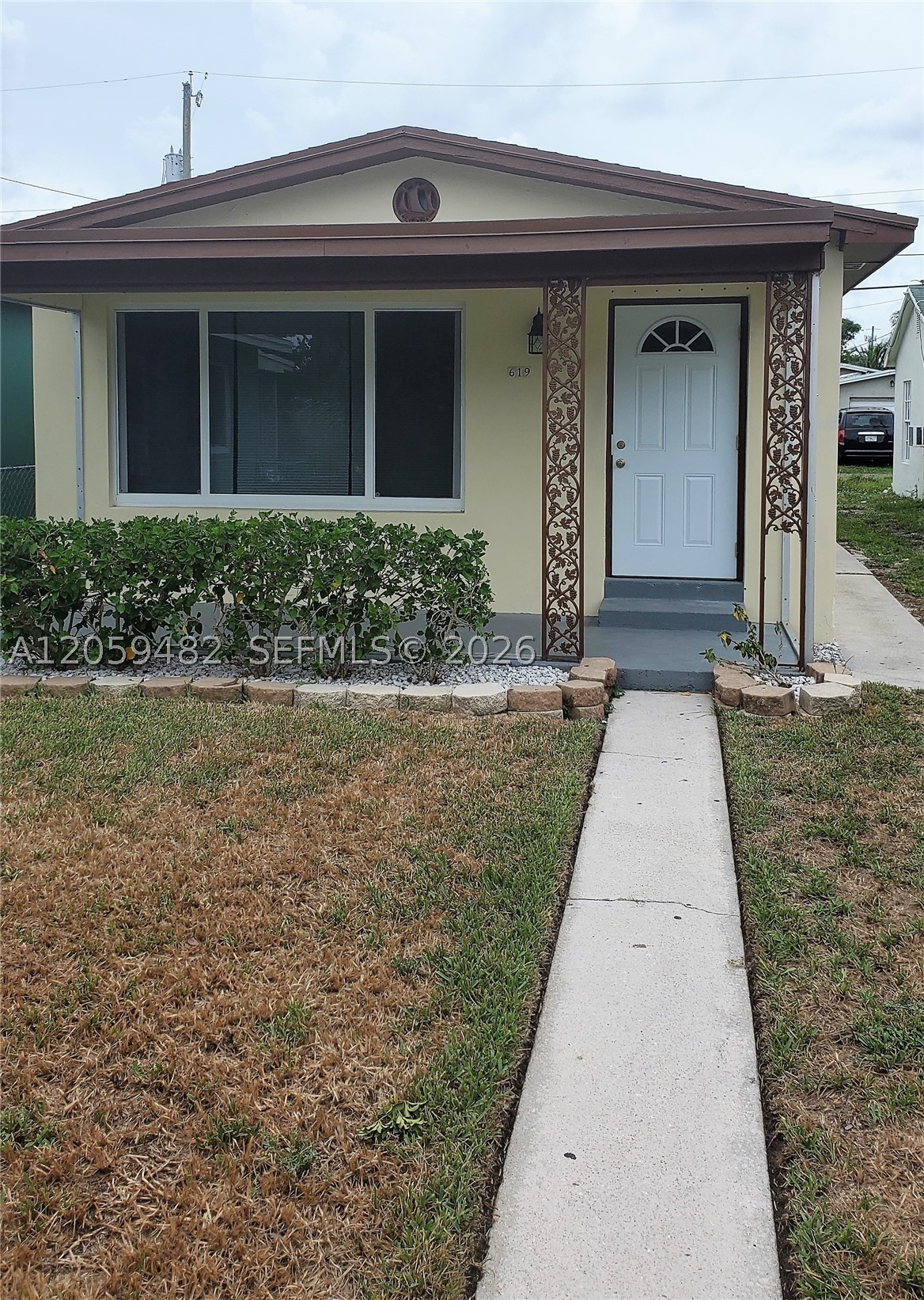 Rare opportunity to own a charming single-family home in the heart of Lake Worth Beach's desirable Tropical Ridge neighborhood. Homes in this area rarely become available, making this a unique chance to own in one of the city's most sought-after communities. This well-maintained 2-bedroom, 1-bath home offers the privacy of a detached residence, a spacious front yard, and a private backyard with rear alley access—perfect for entertaining, gardening, additional parking, or creating your own outdoor oasis. Just minutes from the beach, downtown Lake Worth Beach, local restaurants, cafés, shopping, and parks, this home combines location, charm, and endless potential. Whether you're looking for your primary residence, a seasonal getaway, or an investment opportunity, this is a property you won't want to miss.