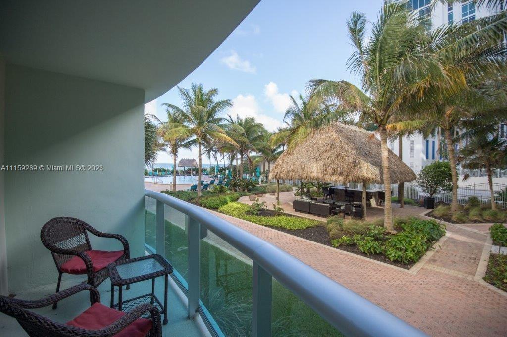 Resort like condo on the ocean with two pools, gym, tiki bar, convenience store and more. Spacious ground floor unit (still 5 feet above ground for privacy) with large kitchen and walk in closet. Polished marble flooring throughout. Relax on your balcony with a great view of the pool and ocean on the background. Pets ok. Great investment opportunity as can be placed in short term rental program to pay for itself and more! Updated 2024 monthly maintenance is $934.86/mo. Seller Motivated!!