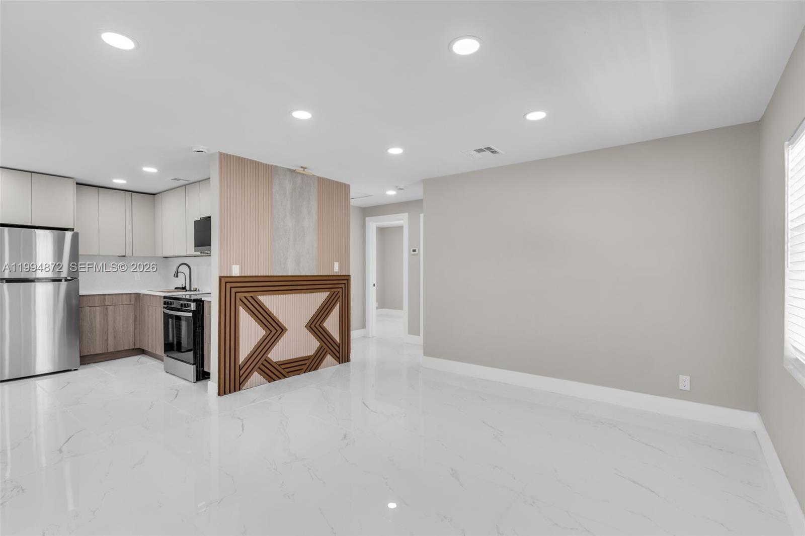 Modern, move-in-ready, and beautifully remodeled—this 2-bedroom, 1-bathroom home is a standout! Offering 725 sq ft of thoughtfully upgraded living space, this property showcases sleek finishes and a fresh, contemporary design throughout. Step inside to a bright and open layout featuring updated flooring, a stylish kitchen with modern cabinetry, and a fully renovated bathroom with clean, elegant touches. Every detail has been carefully curated to create a comfortable and functional living space.

Situated on a lot with great potential, there may be opportunities for expansion, outdoor enhancements, or future value-add (buyer to verify zoning and possibilities). Conveniently located near shopping, dining, major roadways, and just a short drive to the beach.

Perfect for first-time buyers or investors seeking a turnkey property with upside potential—don’t miss this opportunity!