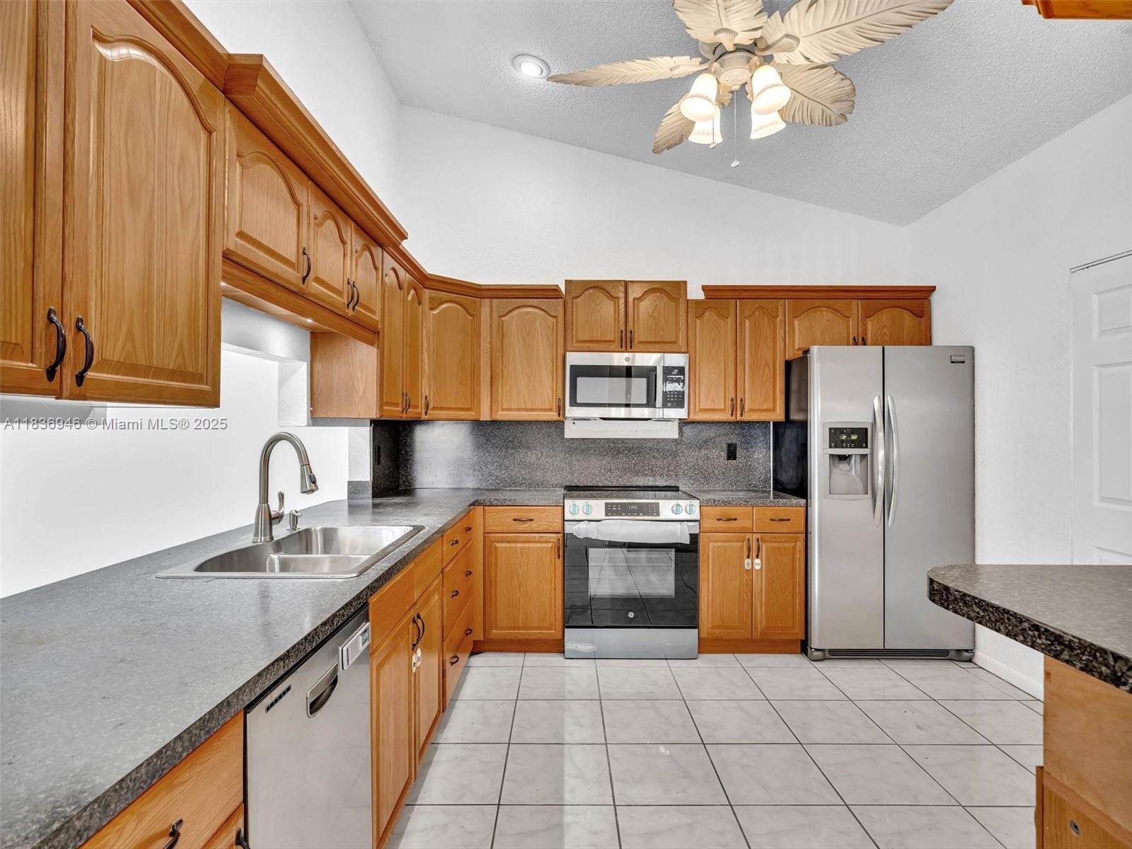 Ideal location! Small, well-maintained community in Key North, Dania Beach. A hidden gem! Steps from Publix, shopping, restaurants, and Hard Rock Airport. Close to all highways (I-95 and the Turnpike), schools, and places of worship. Brand new, high-end appliances. The fourth bedroom is used as a family room/study. Large walk-in closet in the master bedroom. The only and largest unit available in Key North. UNIT HAS BEEN RENTED @ $3000 UNTIL SEPTEMBER 2026 .