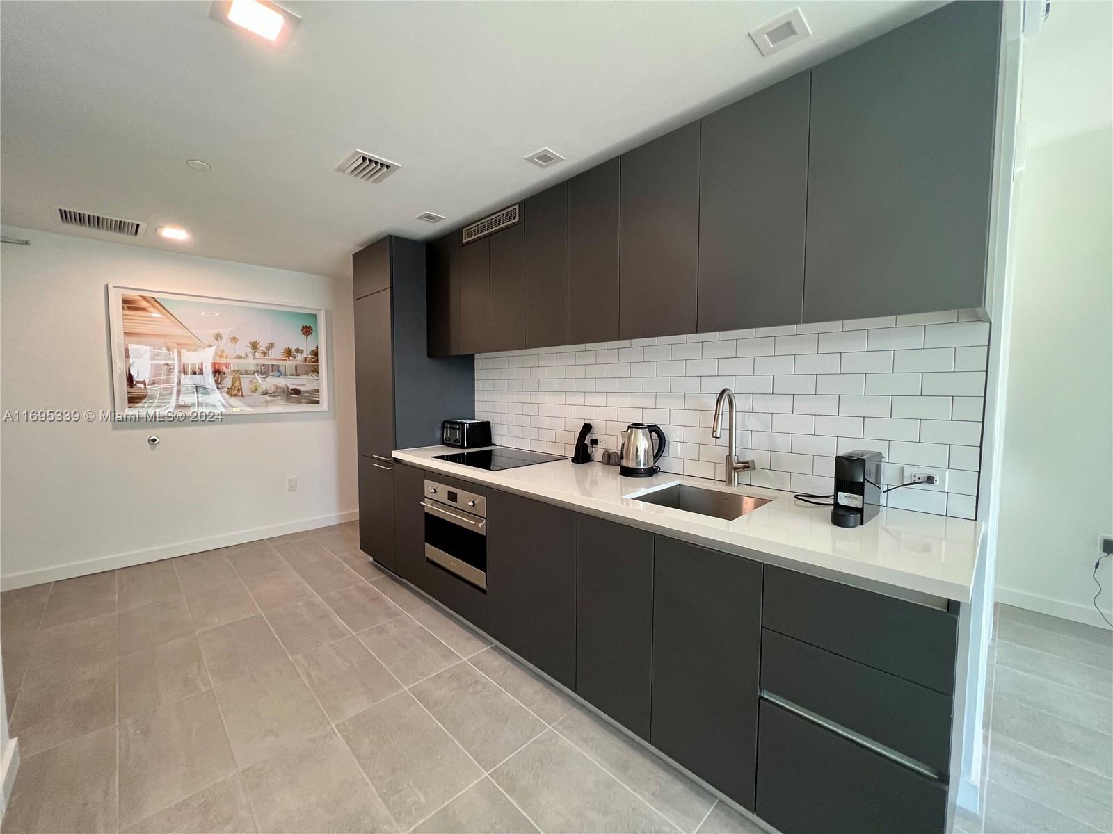 227 NE 2ND STREET CONDO - Residential