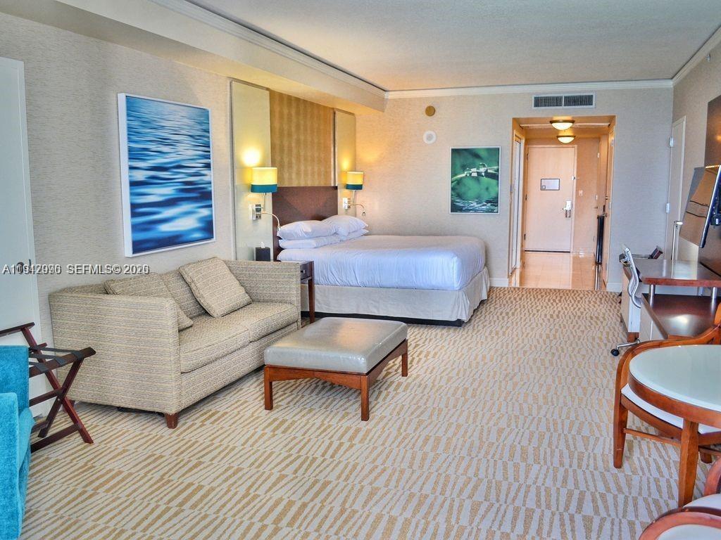 Luxury accommodations at Trump International Beach Resort offering 5 star amenities and services. This Jr suite studio offers breathtaking views of the ocean along with mesmerizing sunrise. This unit has an owners closet and a washer dryer unlike the other studios. The property is not currently in hotel management program but can be put in after closing and have them operate all rentals, bookings and upkeep and then you use it at your leisure without any hassle! The unit comes fully furnished. Amenities include a gym, spa, restaurants, bars in the lobby pool & beach area, food service, 2 pools, and more!