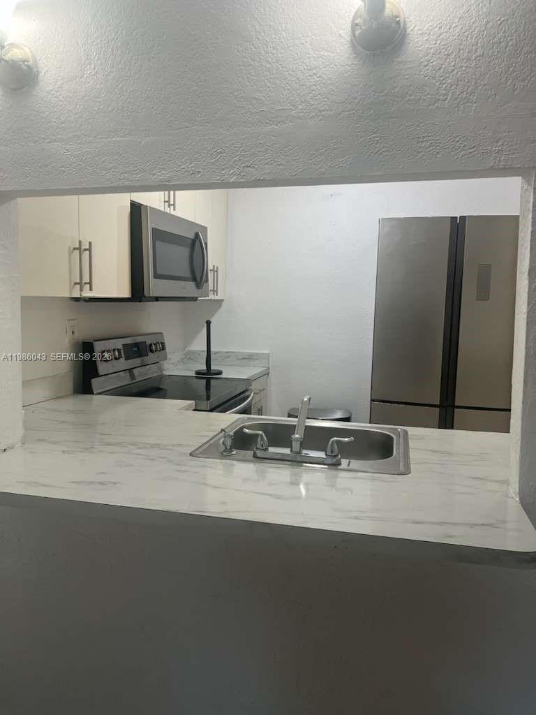 Spacious and well-maintained 1/1 condo located in Yolanda Villas. An excellent investment opportunity, this unit is currently leased at $1,650 from July 1, 2026, through June 30, 2027, providing immediate and stable rental income.

The listing price reflects a seller contribution toward a potential special assessment currently under review by the Association.

Ideally situated near major highways, shopping centers, restaurants, schools, and public transportation, this property offers both convenience and strong long-term investment potential.