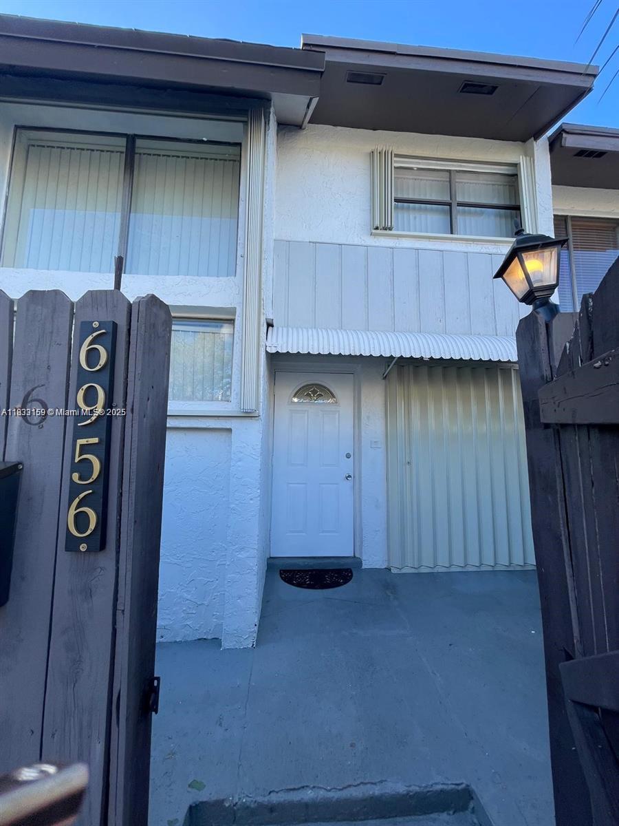 Beautifully renovated 4-bedroom, 2-bath townhome, tucked inside the secure and welcoming Snapper Creek gated community. This home blends comfort and style with spacious, light-filled living areas, elegant crown moldings, and a rare ground-level bedroom?perfect for guests, an office, or your private retreat. Step outside to your private backyard patio, or take advantage of resort-style amenities including pools, tennis courts, a clubhouse, and 24/7 security for complete peace of mind. All this, just minutes from top-rated schools and shopping.