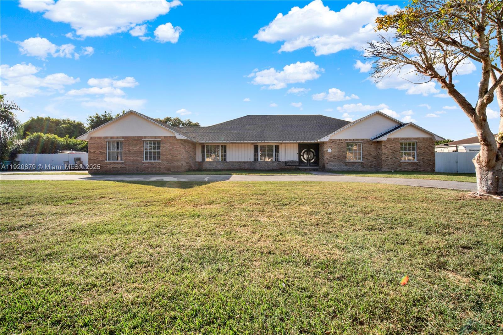 Seller Incentives:  This beautifully updated home features nearly 3,800 sqft of living space on an almost 21,150 sqft lot, offering spacious one-story living with soaring vaulted ceilings, wood flooring throughout, and a true open-concept layout. The chef’s kitchen includes KitchenAid stainless steel appliances, an oversized natural-stone island, high-end quartz countertops, real wood cabinetry, and an inside bar for entertaining. The home offers two remodeled bathrooms, walk-in closets in every bedroom, a spacious laundry room, a 2-car garage, and an additional detached garage. The outdoor area is built for gatherings with a full bar, BBQ setup, expansive covered patios, pool, and a boat. New roof in 2021. No HOA and low taxes. Move-in ready and easy to fall in love with.