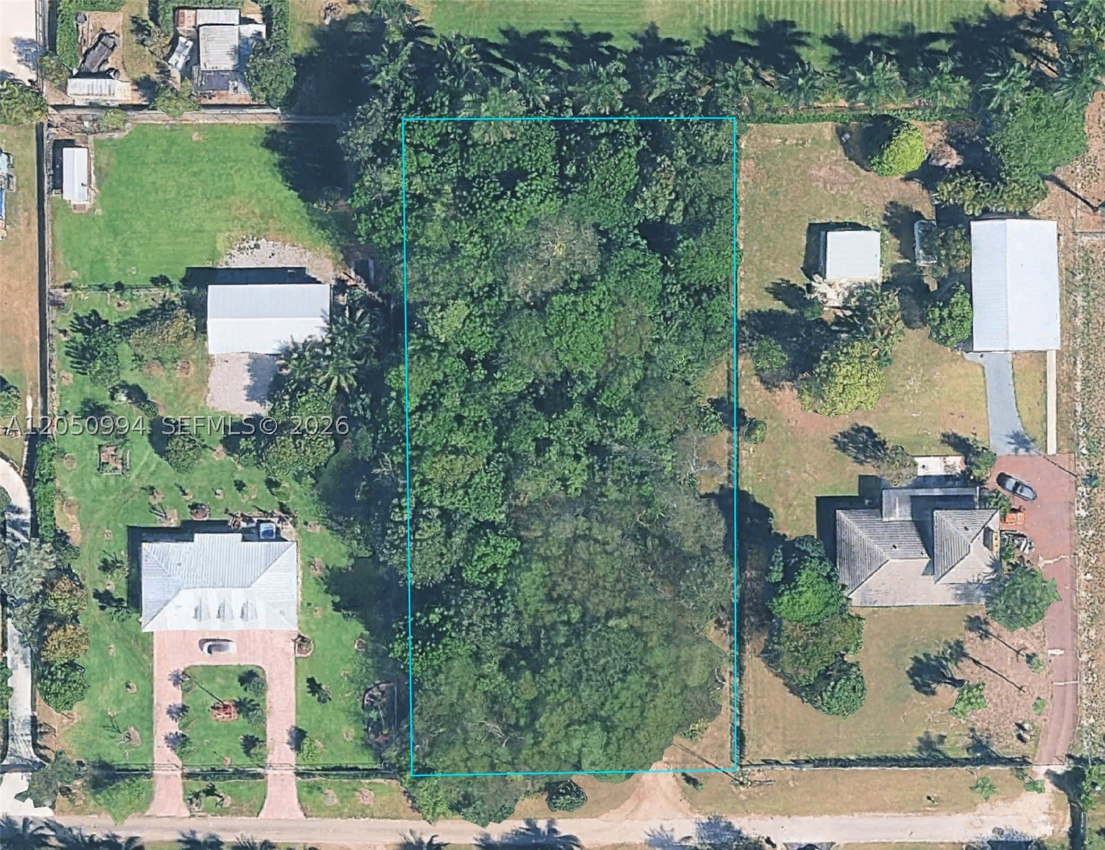 Prime Redland agricultural parcel offering rare buildable potential on 1.13 acres of mature hardwood-studded land. This south-facing lot in Silver Palm Acres sits on paved SW 234th Street frontage with established infrastructure—electric and water available at the street, rock-solid foundation. Zoned for agricultural use with single-family residential opportunity. Property has established native oaks which creates immediate landscaping value and privacy. Ideal for buyers seeking authentic Redland character: quiet, spacious, and positioned in one of South Florida's most desirable agricultural communities. No appointment necessary.
