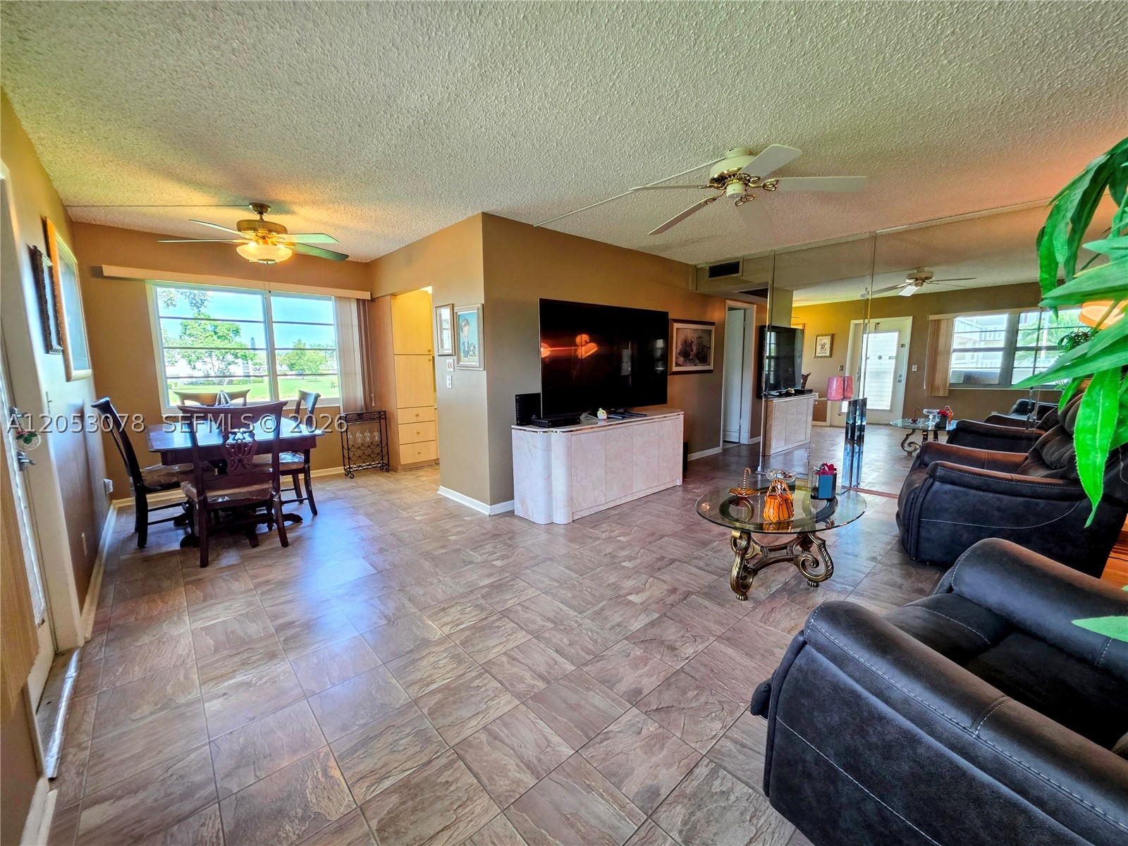 Welcome to this fantastic condo in the highly desirable Century Village Active Adult Community! This second-floor unit offers peaceful views from a spacious screened-in balcony, perfect for relaxing, dining, or entertaining. This condo has impact windows and comes fully furnished.

Investor-friendly opportunity! The unit is rentable immediately after purchase, with the Fanshaw section allowing a minimum 90-day lease. Enjoy resort-style amenities including a clubhouse with fitness center, social spaces, live theater, classes, tennis, pickleball, shuffleboard, and more. Conveniently located near the clubhouse, places of worship, and community entrance.

HOA includes WiFi, basic cable, and water. Please note there are two separate monthly HOA fees: Fanshaw HOA $439.75 and Cen-West HOA $301.57, for a total 2026 monthly HOA of $741.57. A great opportunity for investors or those seeking a vibrant active adult lifestyle!
