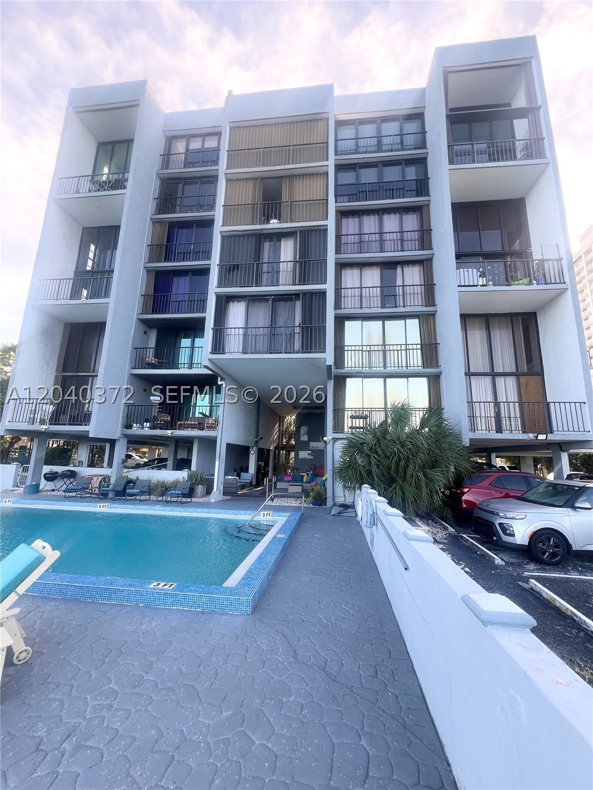 GREAT LOCATION WITH MILLION DOLLAR VIEWS! This corner condo apartment features 1 bedroom, 1 full bathroom in-suit, and 1 half bathroom, plenty of closet, tile floor in living/dining areas and carpet in bedroom, open kitchen and a large wraparound balcony with SPECTACULAR unobstructed water views of Biscayne Bay what makes this apartment a unique gem rare to find. Las Olas Condominium is strategically located next to the bridge to North Bay Village, less than 2 miles from the beach, a few minutes driving from the corridor of Biscayne Blvd. and close to restaurants, shopping, schools, supermarket, malls and much more. Condominium association has a new elevator, a fire alarm system recently installed and has passed building recertification and completed SIRS.