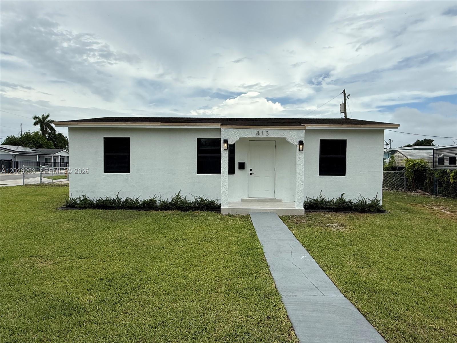 Completely remodeled Single Family home in the heart of Florida City! This beautiful property features brand-new flooring, impact windows and Doors, new dimensional Shingle roof, new plumbing, new water heater, updated electrical system, New kitchen with quartz countertop and a fully renovated bathroom. Spacious lot with plenty of parking space for multiple vehicles. Property will be delivered with new appliances including refrigerator, range, and microwave, as well as a new air conditioning system installed prior to closing. Excellent opportunity for both homeowners and investors, as the property lot is zone duplex offering future expansion and investment potential. Conveniently located near major highways, shopping centers, schools, and parks. Perfect starter home with room to grow!