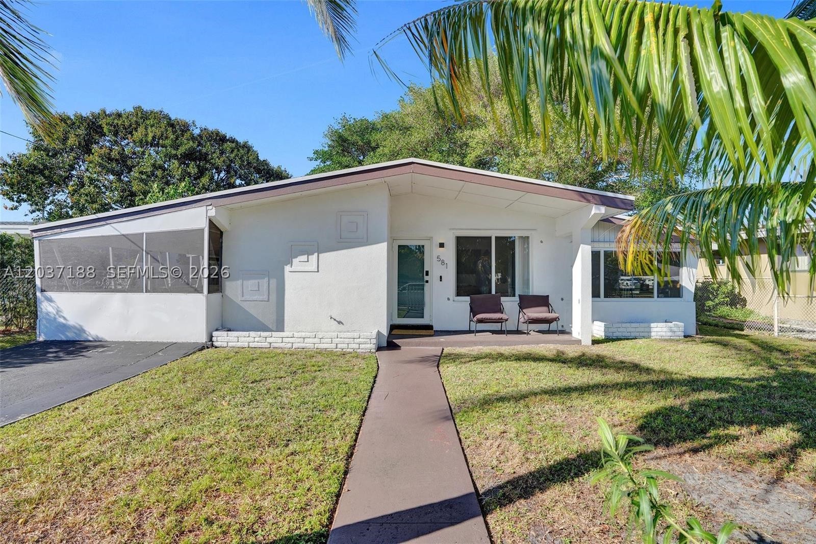 Mid-century modern gem! Conveniently located close to major highways and Aventura. The perfect starter home or investment property. Currently rented 2 bedroom, 1 bathroom updated home with the coolest flex room which could be used as a vinyl room, library or any creative space you can imagine. This home is thoughtfully updated and has the perfect layout!