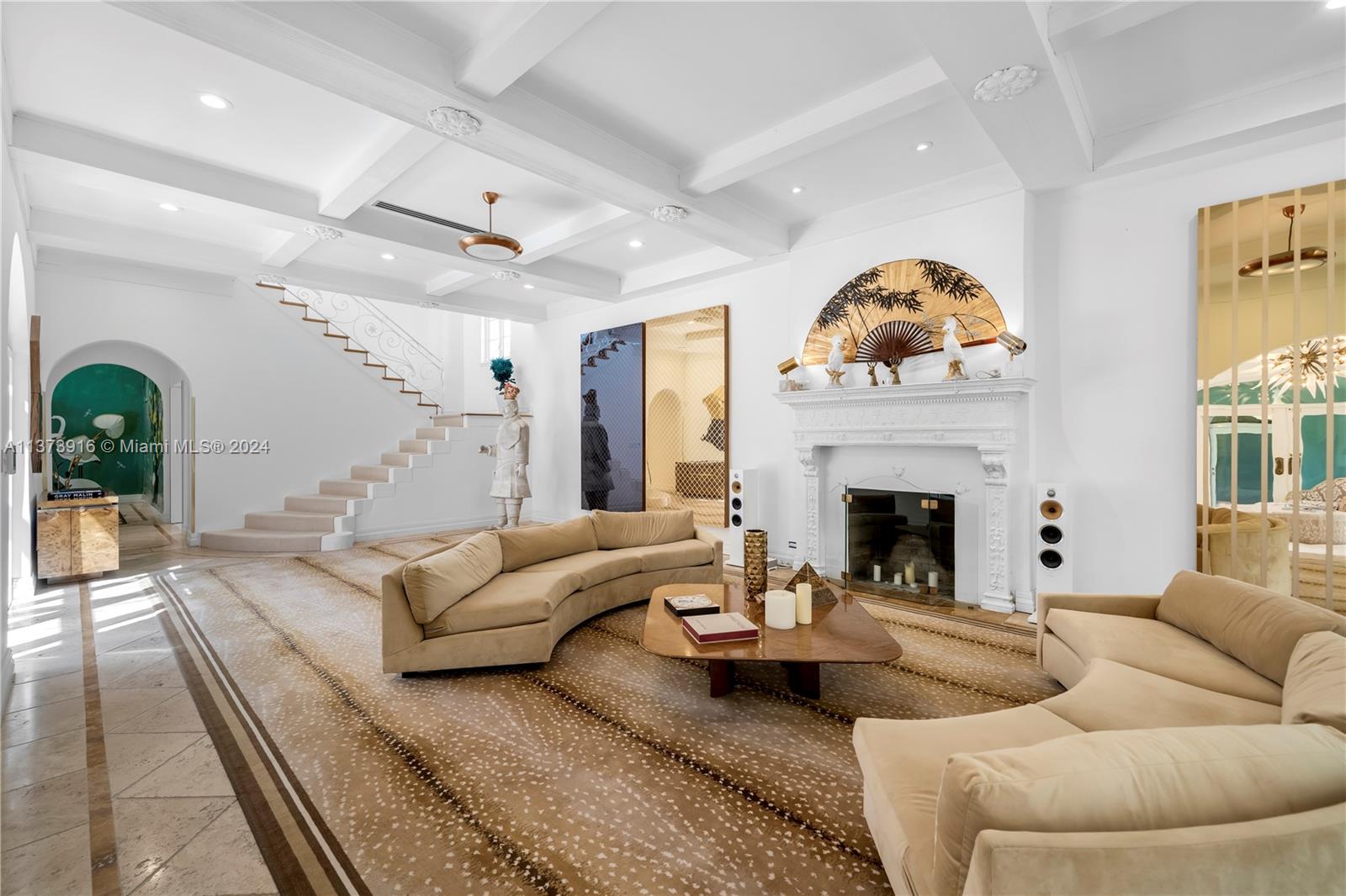 Step into this vibrant & iconic Miami Beach estate which seamlessly combines old-world charm w/ modern design. Situated on a double lot, this 9BD & 8.5BA residence boasts a detached guest house, serene courtyard, custom pool w/ built-in chaise lounges, a captivating poolside terrace, an oversized pergola & a 4-car garage. Inside find interiors curated by Ximena Caminos w/ stunning architecture, impact windows, high ceilings, a movie theatre, & elegant living spaces. The gourmet gas kitchen boasts a breakfast area, butler's pantry, & exceptional kosher design that includes double sinks, dual ovens, & 2 refrigerators. The primary wing offers 2 walk-in closets, 2 baths, a steam room & an executive office w/ a kitchenette, private stairway entrance & elevator leading to the rooftop terrace.
