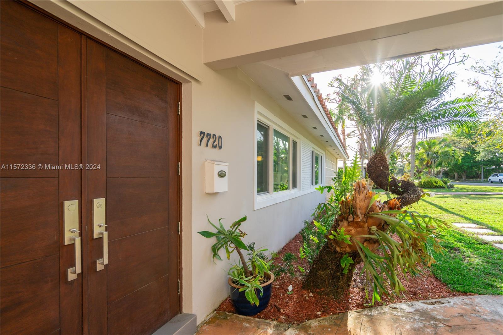 Luxury living in Palmetto Bay with this stunning 3 bedroom, 3 bathroom Estate Home. Open living spaces with tons of natural light and spanning over 2,355 sq ft, on a large lot of 17,446 sq ft located on a peaceful street. Impact windows and doors, including silent motor on the garage door, 24 x 24 tile flooring throughout, an open kitchen with real wood cabinets, stainless steel appliances with a professional grade large size Refrigerator and Freezer, unique features include luxury bathrooms with premium finishes, Legrand premium outlets, and a backyard oasis overlooking a sprawling patio and well-maintained pool with screened enclosure.