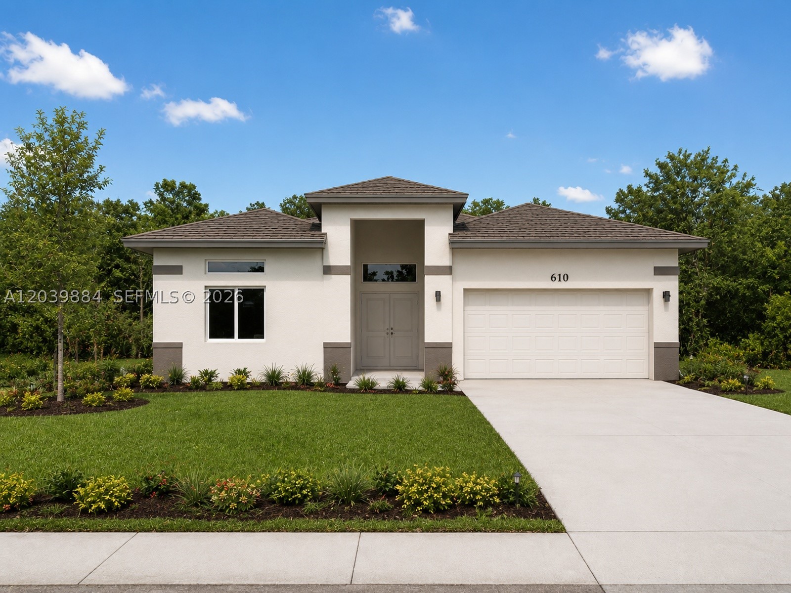 UNDER CONSTRUCTION!!! Stunning new construction home offering approximately 2,900 sq. ft. of modern living space. Featuring 5 spacious bedrooms, 3.5 bathrooms, and a beautiful contemporary kitchen with premium finishes. Elegant porcelain tile flooring flows throughout the home. The private in-law quarters provide flexibility for extended family or guests. Oversized bedrooms include generous walk-in closets, while the luxurious primary suite boasts dual his-and-her sinks, a separate soaking tub, and a walk-in shower. Conveniently located with easy access to shopping, I-95, and beautiful beaches. A perfect blend of style, comfort, and convenience. Photos are of a similar home; tile, cabinetry, and other finishes may vary.
