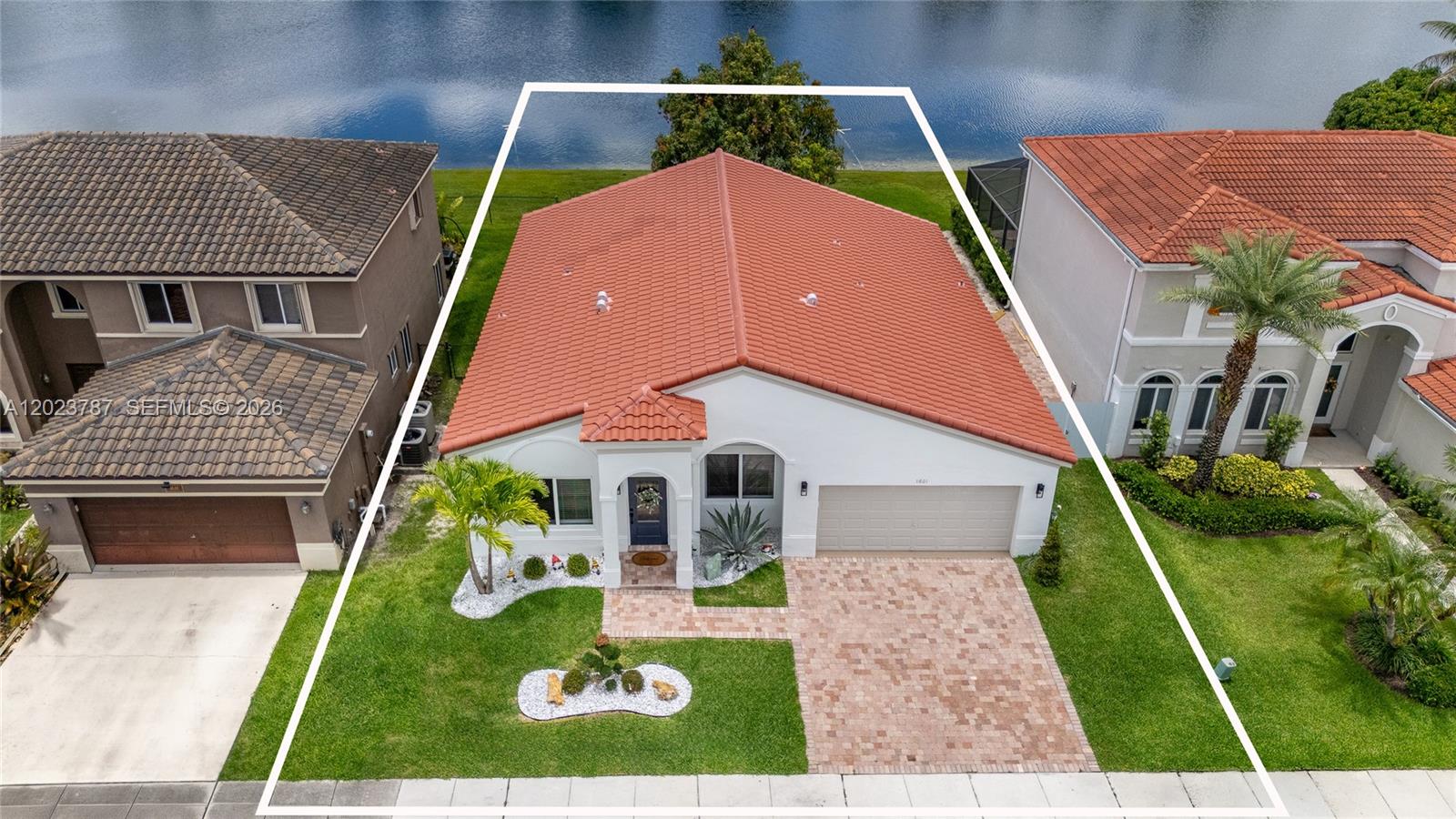 Immaculate, breathtaking lake view, 3 bedroom 2 bath, in sought- out Harmany Lakes Community, completely remodeled, with distinctive designer-curated finishes, no details were spared in this full top to bottom renovation, completed with tile roof, impact windows and doors, abundant natural light and soaring high ceilings,
West facing with amazing sunsets Zoned for A rated schools.