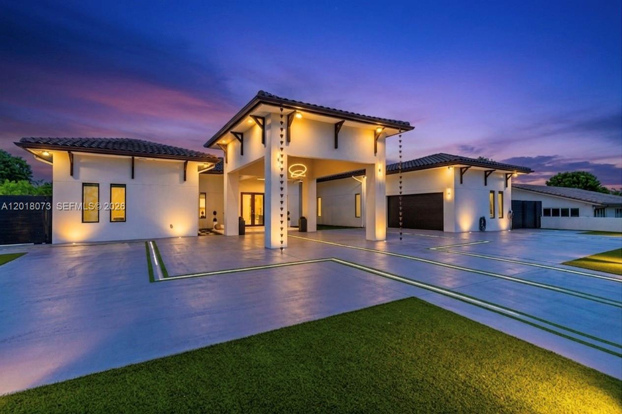 Introducing Casa Encanto — a timeless estate reimagined for modern luxury living. Set on nearly 1 ultra-private acre, this exceptional 5-bedroom, 6-bathroom residence blends warm architectural character with refined contemporary design. Soaring vaulted ceilings, expansive living spaces, and seamless indoor-outdoor flow create an atmosphere of elegance and tranquility throughout. The resort-style grounds feature a sparkling pool, jacuzzi, and lush tropical landscaping, offering the ultimate private retreat for entertaining or everyday serenity. Casa Encanto is a rare sanctuary where sophistication, comfort, and nature exist in perfect harmony.