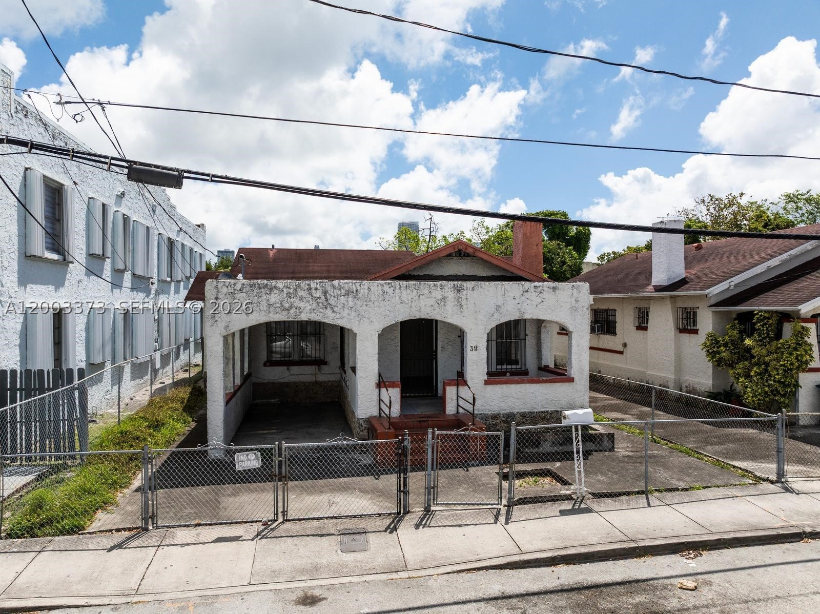 Opportunity in the Heart of Miami to acquire two adjoining multi-family properties 311 & 315 SW 10 Avenue each lot is 5,000 sq ft, combined 10,000 sq ft 100 X 100. Property consists of 2 folios 01-4102-002-0500 and 01-4102-002-0510 Property Zoned T-4. Rebuild in one of Miami's rapidly transforming neighborhoods! Located just minutes from Marlins Stadium and vibrant Little Havana, this property sits within an Opportunity Zone, making it especially attractive for savvy investors looking to capitalize on tax advantages and long-term growth. The surrounding area is experiencing significant revitalization, with new construction and renovations happening throughout—positioning this property perfectly for future appreciation. Cash or hard money loan only. No access to buildings or property until terms and conditions are agreed upon in a fully executed contract. Please do NOT walk the property.
