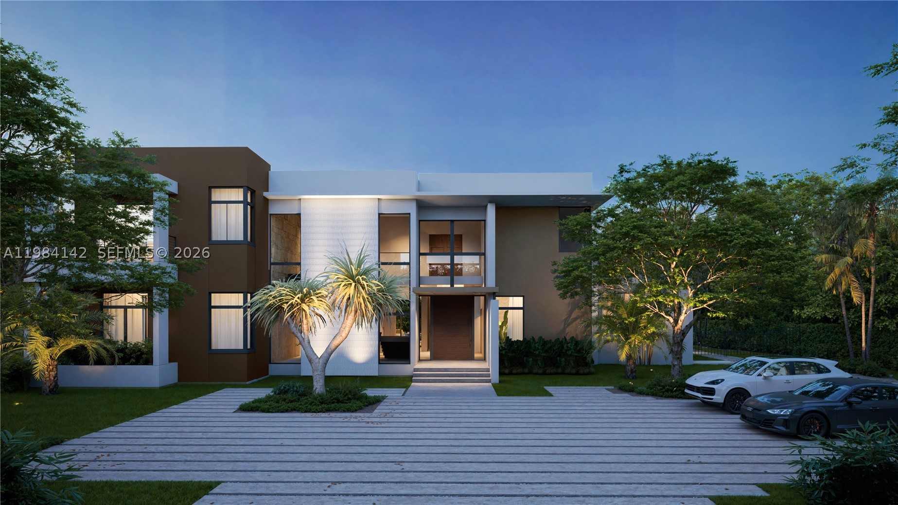 Currently under construction by award winning Hollub Group and scheduled for completion in fall 2026, this exceptional estate is set on an acre in beautiful North Pinecrest and captures the essence of California Modern design. Expansive walls of glass, stacked stone, design tiles, and richly toned wood are thoughtfully composed to create a residence that feels both striking and warmly livable.
A sculptural floating staircase serves as a dramatic architectural centerpiece, while the home’s open, light-filled interiors are designed for effortless indoor-outdoor living and entertaining. Spanning more than 8,000 square feet, the residence offers 7 bedrooms, 8.5 bathrooms, a 3-car garage, office, loft and 2 laundry rooms.
The heart of the home is a custom gourmet kitchen paired with a fully equipped prep kitchen, seamlessly complemented by a temp.-controlled wine room and a sophisticated clubroom with stone fireplace and full bar overlooking the dramatic infinity edge pool/spa. An elevator and state-of-the-art home automation and Lutron lighting system ensure modern convenience throughout.

Outdoors, lushly landscaped gardens surround the  summer kitchen perfectly suited for alfresco dining and entertaining with phantom drop down screens. Generator! Blending contemporary architecture with enduring craftsmanship, this estate sets a new benchmark for refined modern living.