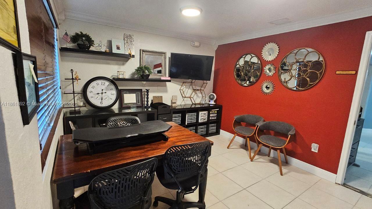 Turn-key 610 sqft office/light warehouse in prime Doral location. Fully furnished & decorated, ready to move in! Includes water & trash private full bath, kitchenette, and space for 4–5 desks Front & back doors, storage, and 2 assigned parking spaces+ ample guest parking. Gorgeous lake views. Perfect for small businesses, startups, or professional services seeking a modern, an office solution in the heart of Doral. What truly sets this suite apart is the move-in ready condition. Here, everything is prepared and operational from day one. Add in the private bathroom, kitchenette, dual entrances, storage, and lake views, and it becomes clear that this is not just an office — it’s a complete business solution. Possible sublease private off