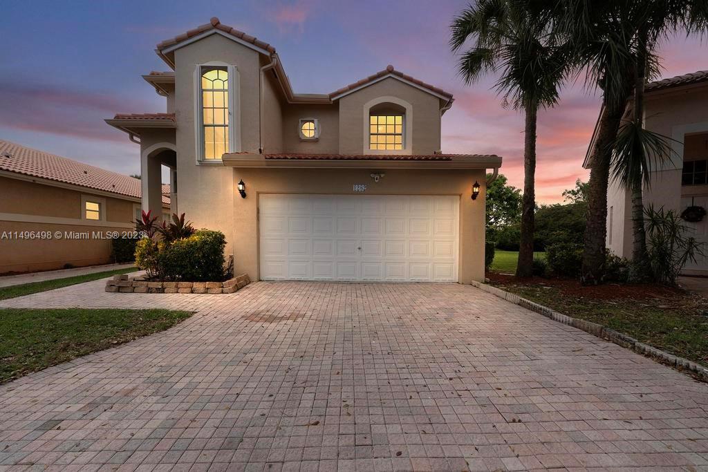 A MUST-SEE! This spacious 4 Beds/2.5 Baths single-family home is in a cul-de-sac in Pembroke Isles, a luxury gated community. Home faces east and has plenty of windows and high ceilings, providing natural light the WHOLE day. Open backyard, 2-car garage and driveway. On the ground floor, we have the master suite w/ two closets, the living and formal dining rooms, breakfast nook, kitchen with granite countertops and stainless steel appliances. The microwave, refrigerator and A/C units are less than 2 years old. Upstairs, three more bedrooms and a full bath. Pets allowed! Accordion shutters, NO carpet and quick move-in, as NO association approval is needed. HOA also provides basic cable and basic internet, lawn maintenance and home alarm. Tour it in person to appreciate its value!
