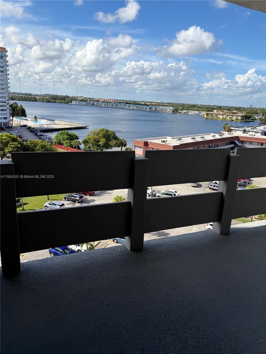 Wake up each morning to breathtaking lake views from the spacious primary suite, complete with direct balcony access for your morning coffee. With two private balconies, you’ll enjoy tranquil water views and fresh breezes from sunrise to sunset. This unit is a corner unit with exclusive privacy. Additional highlights include two full bathrooms, generous closet space, and wood flooring throughout. The community offers a peaceful setting with walking paths around the lake, a clubhouse, pool, and easy access to major highways, nearby shops, restaurants, and medical facilities. This condo blends comfort, convenience, and stunning natural beauty—your perfect Florida lifestyle awaits.