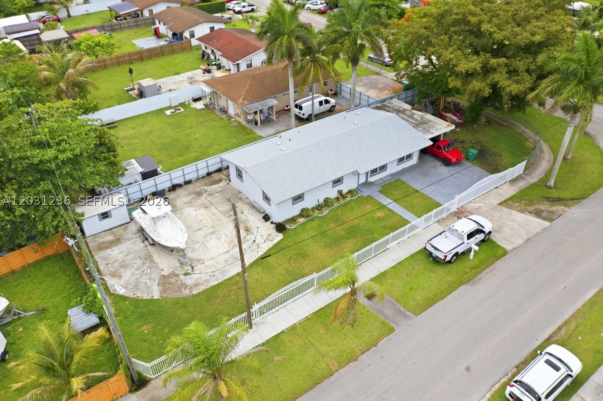 Excellent opportunity in Homestead! This property sits on an oversized 9,000 sq. ft. lot with a BRAND NEW ROOF (2 years old)and is currently configured as a 2-bedroom, 1-bath main residence plus a separate 1-bedroom, 1-bath unit with its own private entrance, kitchen, and full bathroom. The layout offers flexibility for extended family, guests, or potential rental income.

The home can easily be converted back to its original 3-bedroom, 2-bathroom configuration if desired. All appliances are included, including the washer and dryer, making this a move-in-ready opportunity.

Enjoy the spacious backyard with plenty of room for entertaining, parking, a boat, RV, or future improvements. A versatile property with endless possibilities in a convenient Homestead location!