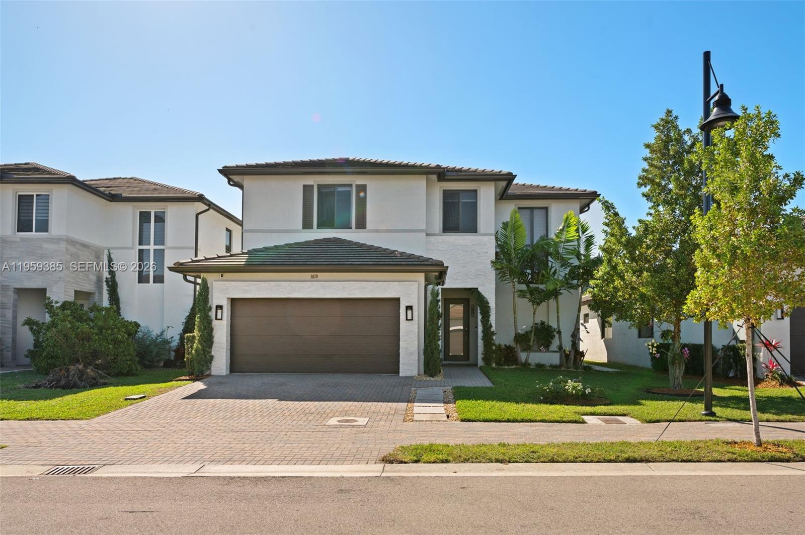 Stunning Nearly New Modern Home with Luxury Upgrades and Resort-Style Living. Step into this exceptional 5-year-old single-family home offering 3,964 SQFT of actual area, beautifully design and filled with premium upgrades and impeccable taste. With 4 spacious bedrooms and 3 elegant bathrooms, this residence blends modern comfort with sophisticated style. The main level features exquisite contemporary open floorplan, a full water-softening system, and an advanced kitchen osmosis filtration system. The Italian-designed kitchen is a true showpiece—sleek cabinetry, premium finishes, and a massive walk-in pantry create the perfect space for cooking and entertaining. Upstairs, a generous family-style loft provides the ideal spot for movie nights or relaxation. Two comfortable secondary bedrooms accompany a spectacular primary suite, complete with a spa-inspired bathroom, magnificent walk-in closet designed for maximum luxury and organization. Step outside to your private oasis: a modern heated pool, a stylish barbecue area, and a spacious backyard perfect for gatherings or quiet evenings under the stars. Additional highlights include an ample garage, thoughtful upgrades throughout, a layout that balances openness with functionality. Located just a short 4-minute walk from the community clubhouse, you’ll enjoy access to a state-of-the-art gym, a stunning pool, and multiple beautifully designed recreational areas. Close to Downtown Doral, Restaurants and close to everything.