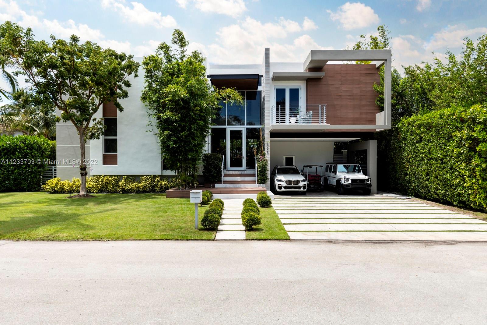A new modern home located on Key Biscayne that redefines contemporary style. Welcome inside this 5 BD and 5 BA + 1 HB, two-story residence that spans 4,400 SF. Recently built in 2017, it’s completely move-in ready. Immediately upon entering the home, residents will find a spacious open floor plan filled with an abundance of natural light and complete with a large living space, dining room and kitchen with Miele appliances. It offers the perfect design balance of clean lines, bold aesthetics, and warm woods throughout. Residents can also experience additional rooms, including a laundry room, office, media room with a projector & hidden screen. Extra features: sound system throughout w/ hidden speakers, smart system to control sound, lights and alarm and Tesla solar panels & battery system.