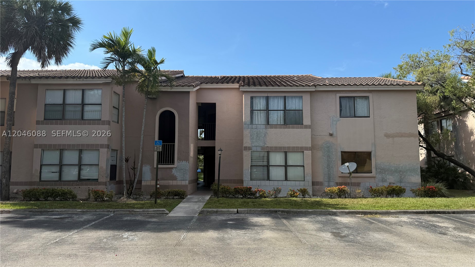 Move-in ready 2-bedroom, 2-bathroom ground-floor condo featuring a spacious split-bedroom floor plan and tile flooring throughout. Bright, open living and dining areas offer plenty of natural light, while the functional layout provides comfort and privacy. Ideally located within walking distance to Nova Southeastern University, shopping, dining, and everyday conveniences. Centrally situated near Broward College, major highways, Fort Lauderdale-Hollywood International Airport, hospitals, parks, and more. Perfect for homeowners, students, faculty, or investors seeking an unbeatable location.