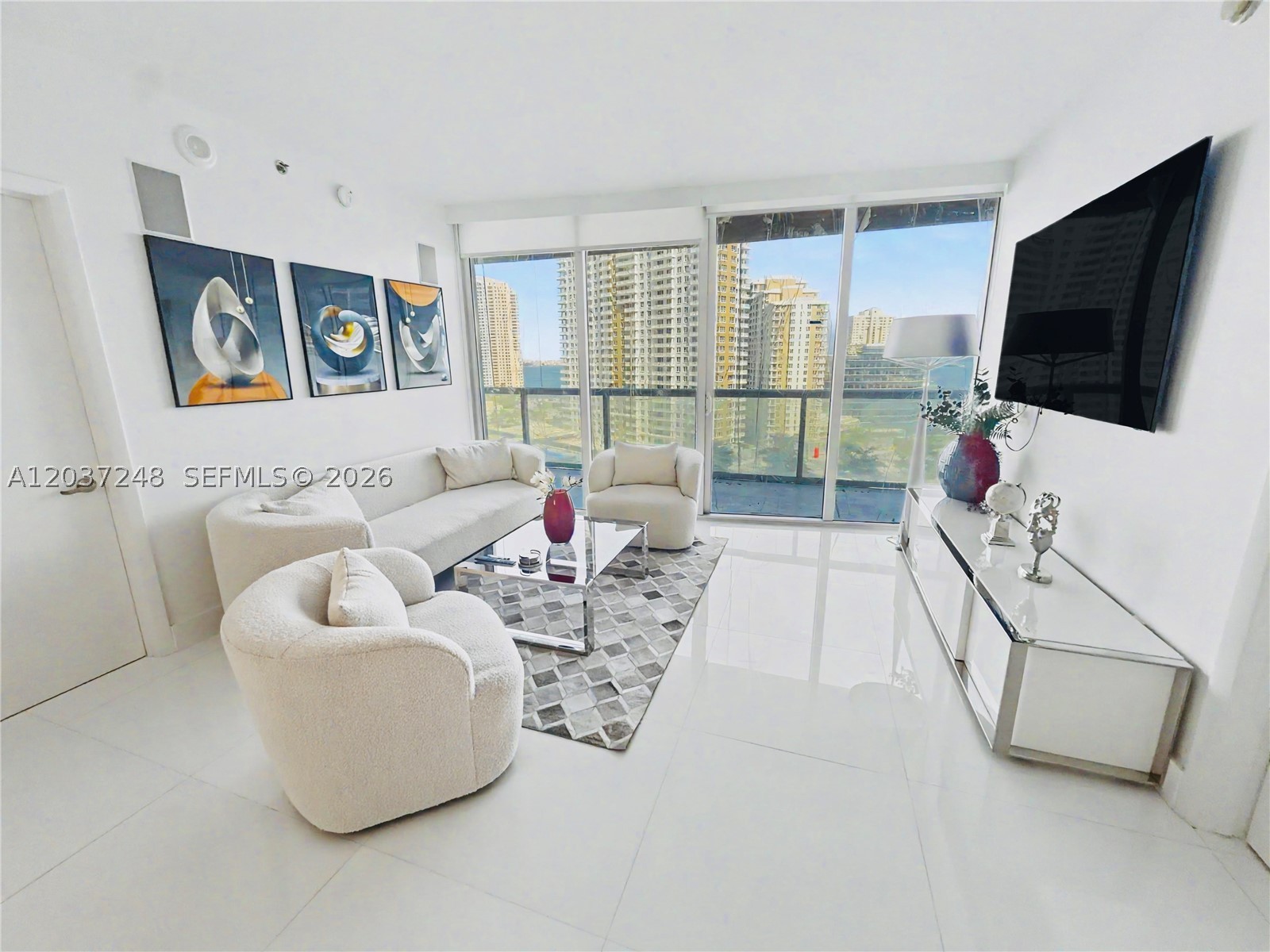 Introducing a stunning fully furnished 2-bedroom + den, 2-bath residence at Icon Brickell, where luxury meets water and pool views. This exceptional condo features floor-to-ceiling windows that showcase sweeping vistas of the bay, river, and skyline, creating a captivating backdrop for your everyday life. Boasting a spacious and functional layout, this luxury residence is designed for both comfortable living and efficient remote work. Enjoy modern finishes throughout, complemented by designer furniture and an updated kitchen and bathrooms that elevate your living experience. As a resident of Icon Brickell, you will have access to an array of resort-style amenities, including an expansive pool deck, state-of-the-art fitness center, rejuvenating spa, valet service, and concierge assistance. Indulge in top-tier dining options right in the heart of Brickell, ensuring that everything you need is just steps away. This residence is offered fully furnished and is move-in ready, allowing you to settle in effortlessly. Please note that the balcony is temporarily closed due to a building restoration project, expected to be completed by December 2026. However, you can still enjoy abundant natural light and partial views from within the unit.