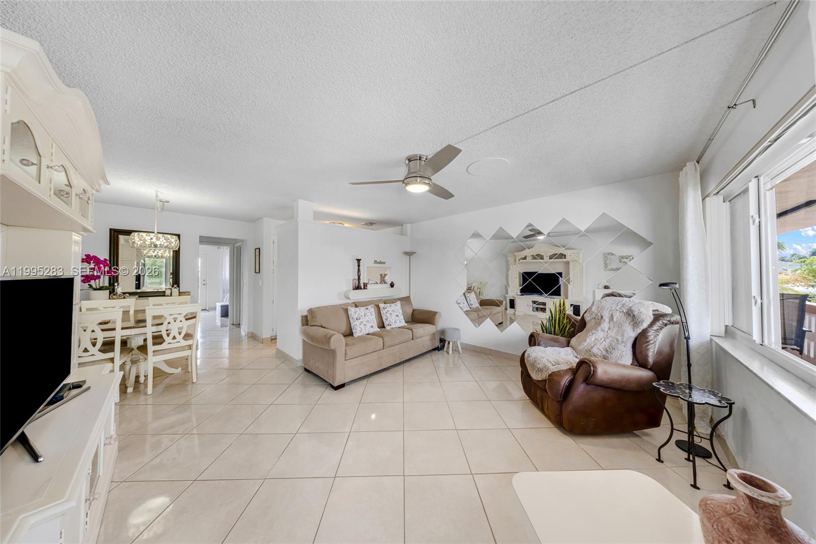 Welcome to this beautifully, fully furnished condo, perfectly located on a well-maintained 55+ community. Enjoy peaceful water views, offering a serene and relaxing atmosphere. The building is financially stable with healthy reserves, giving you peace of mind. Conveniently situated near the airport, major highways, beautiful beaches, and shopping plazas, this home offers easy access to everything you need. Plus, with a low HOA fee, you’ll enjoy a stress-free living experience. This turnkey condo is move-in ready—just bring your personal belongings and make it your own. Don’t miss the chance to own in this vibrant community!