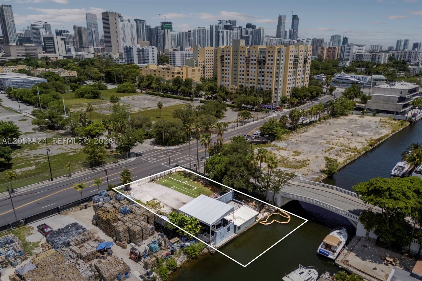 A rare opportunity to acquire a premier Miami River property with highly sought-after D1 Marine zoning at the entrance to Spring Garden. This exceptional waterfront parcel offers 80 feet of river frontage and provides a blank canvas for a wide range of marine industrial uses. D1 Marine zoning permits heavy construction equipment, earth-moving machinery, marine-related businesses, and other specialized industrial operations, making this a scarce and valuable asset along one of Miami's most important commercial waterways. The property includes an existing 575 SF office, offering immediate functionality while plans for future development take shape. Positioned with direct river access and excellent connectivity to Downtown Miami, major highways, and the Port of Miami, this property combines strategic location, flexible marine zoning, and waterfront access in an increasingly supply-constrained market. An exceptional opportunity for owner-users, investors, or marine operators seeking a unique foothold on the Miami River.