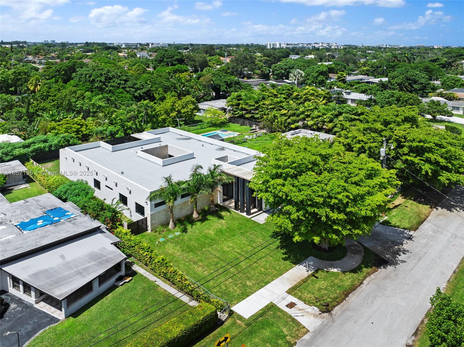 Private Financing available.
Beautifully designed brand new construction residence located in the highly sought-after Schenley Park neighborhood. This home features interiors curated by a top Florida interior designer, showcasing exceptional attention to detail and high-end finishes throughout.
The open layout offers a seamless flow with abundant natural light, complemented by upgraded materials and refined design elements. The property includes a stunning in-ground pool and thoughtfully designed outdoor spaces, highlighted by a private atrium with custom landscaping—creating a tranquil and unique setting.
A true standout in both design and quality, this home combines luxury finishes with a prime Miami location, just minutes from Coral Gables, Coconut Grove, and major roadways.