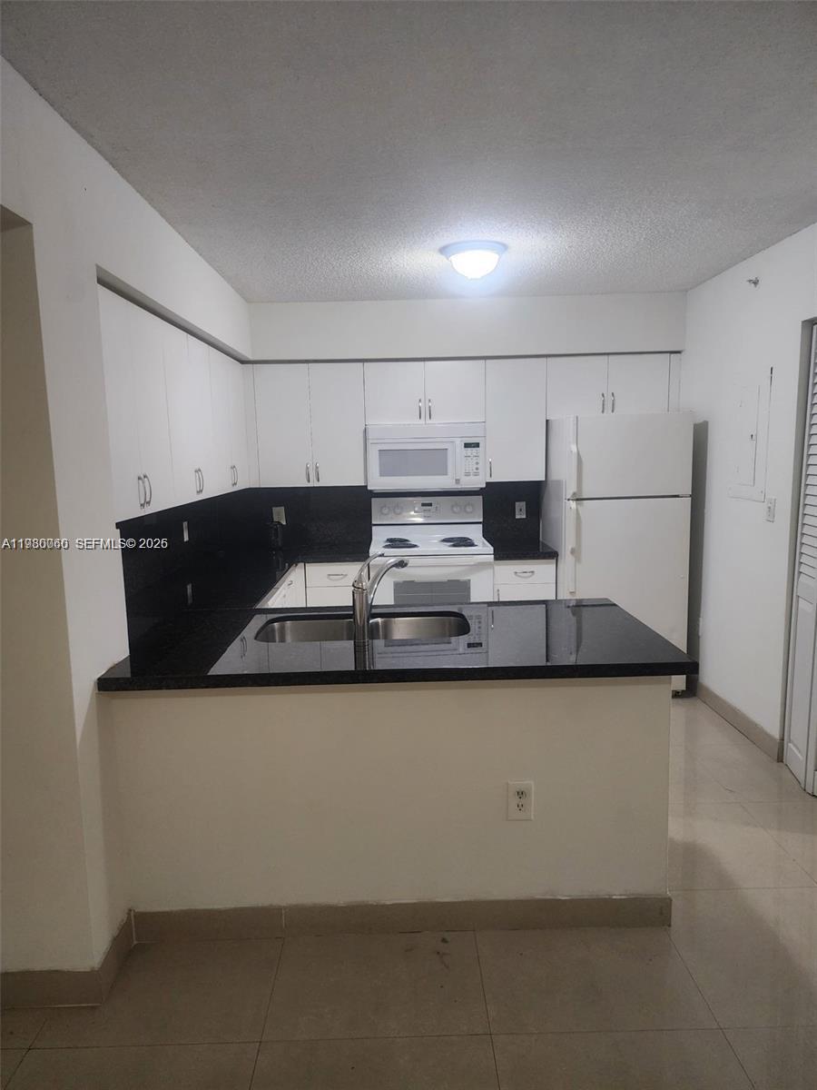 ENCLAVE AT DORAL CONDO NO - Residential
