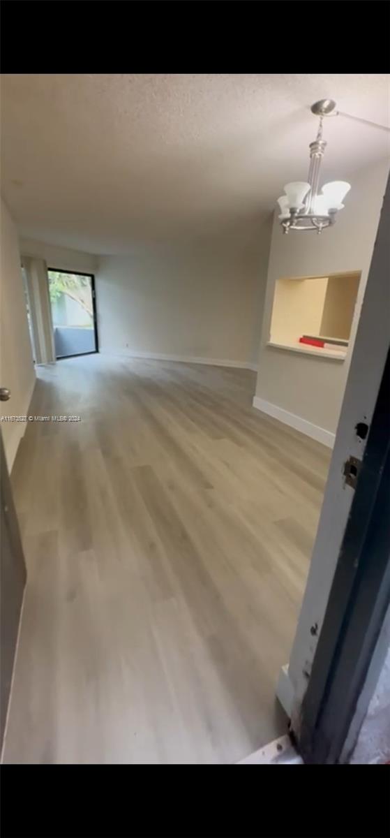 1st floor condo.  New laminated wood floors, Central A/C. Back patio. Water, sewer & trash included in rent.  Community pool. Blinds, window treatments. Dishwasher, independent microwave.  Laundry rooms located on the 2ns & 3rd floors.  Open parking. Fast approval process.
