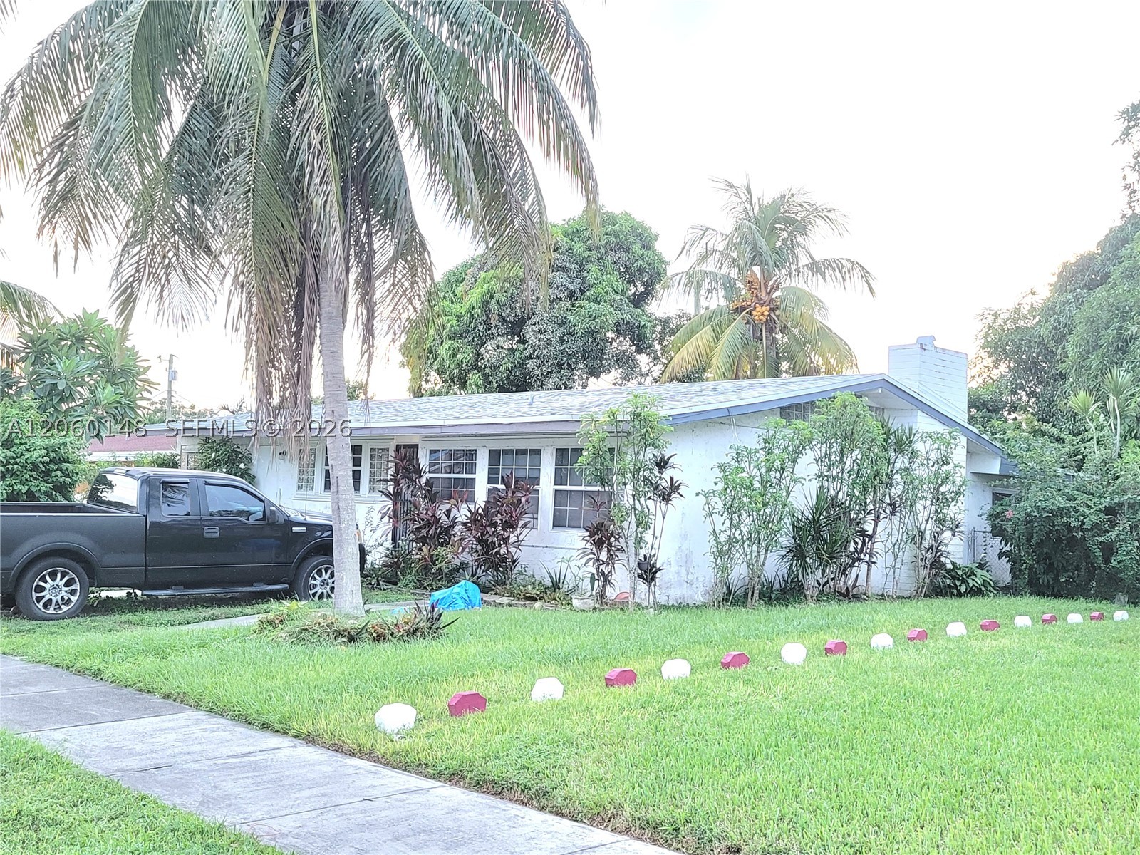 Investor Special! Exceptional opportunity for your next renovation, fix-and-flip, or income-producing investment. This 3-bedroom, 2-bath home is located in the heart of Miami Gardens, just minutes from Hard Rock Stadium, home to Jazz in the Gardens and Formula One, with convenient access to shopping, dining, fitness centers, I-95, and the Florida Turnpike.
The home features vaulted ceilings, a tankless water heater, overhead bedroom storage, and an attached extra room offering excellent rental income potential. The spacious backyard provides ample room for a Pool, outdoor Entertaining, and includes a variety of mature Fruit trees. Best part, No HOA!
Property is being sold in its current condition and requires renovations, presenting an excellent value-add opportunity for experienced buyers. Prospective buyers MUST view the property in person prior to SUBMITTING an OFFER. Property available for showings by Appointment Only with 24 hours notice.