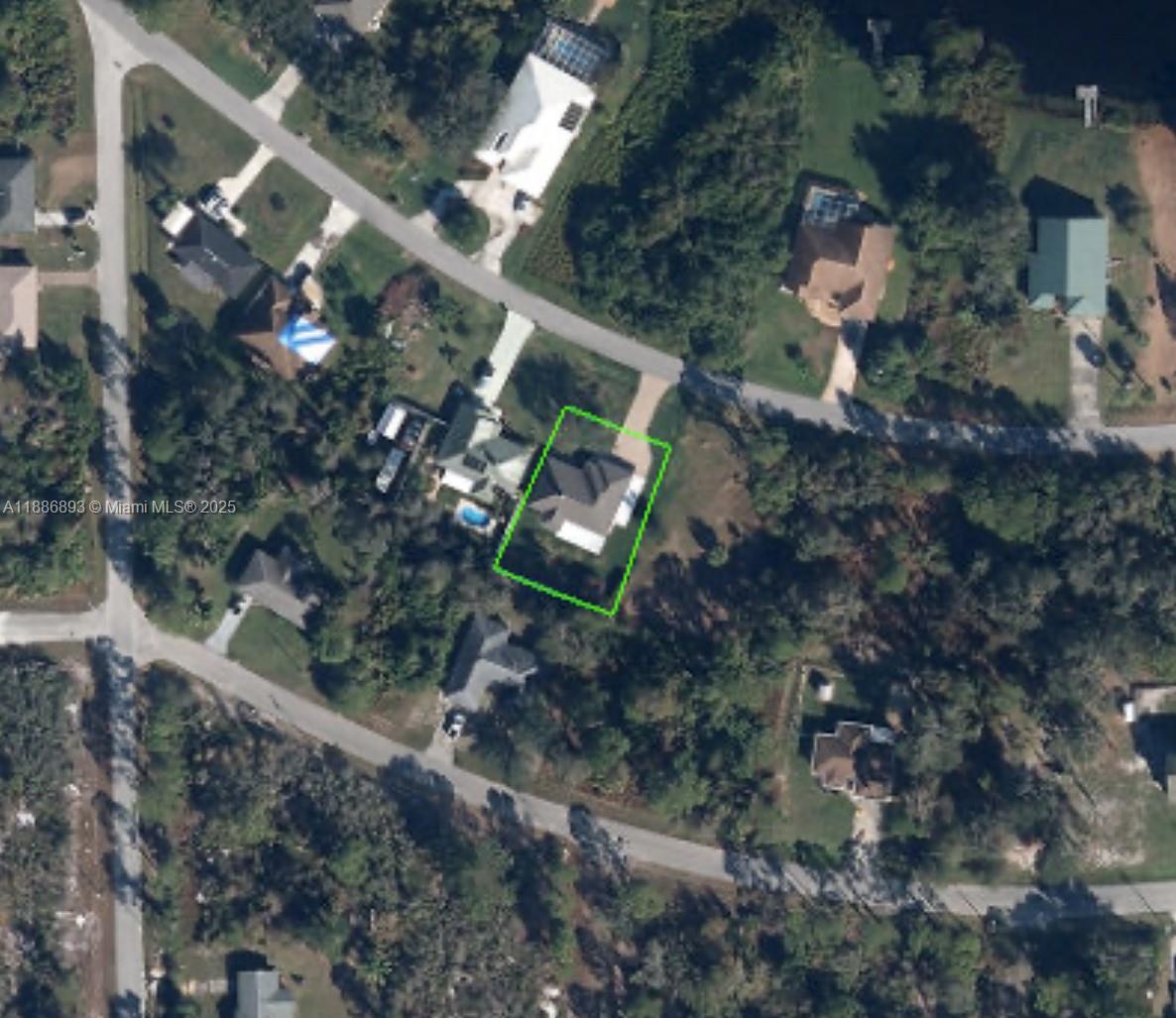Open .23 acre lot available in Lake Placid.