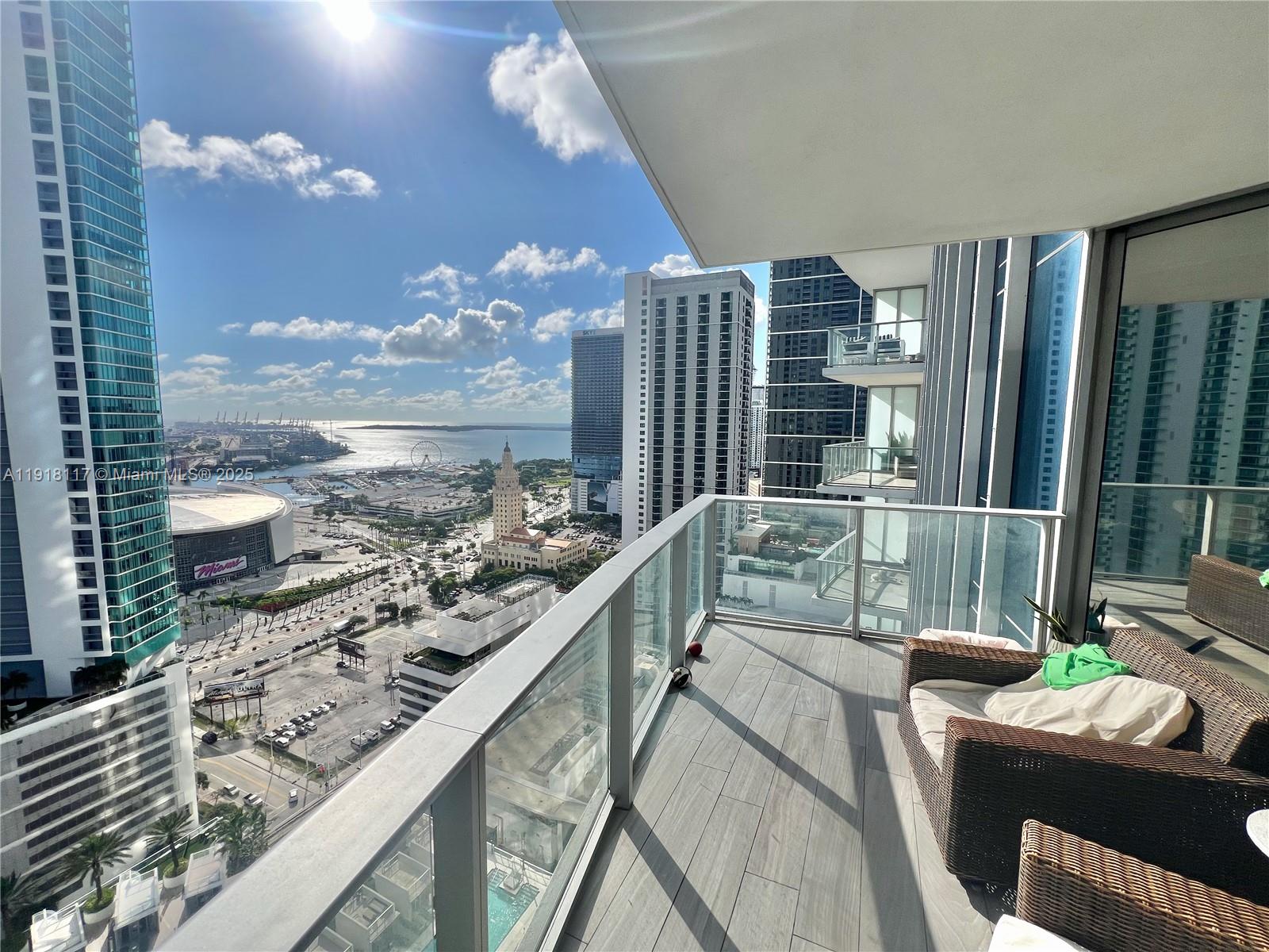 RARE EAST UNIT FOR SALE - Spectacular 1,386 SQFT 1 Bed + Den + 2 Full Baths with water views residence! Subzero refrigerator & Bosch appliances. Private elevator entrance foyer. The Building with the Most Amenities in the World: 2 Tennis courts, Basketball, 5 pools, Spa, Gym, Golf simulator, Recording Studio, Party room, Racquetball, Yoga, Kids play ground, Soccer field, Spectacular rooftop deck. Walking distance to :Metro Mover, All Aboard Florida Train Station, Bayside, Port of Miami, American Airlines Arena, Museums, Adrienne Arsht Center, 15 minutes to Miami Int. Airport. Owner can have 2 cars 1 parking – 1 valet included.