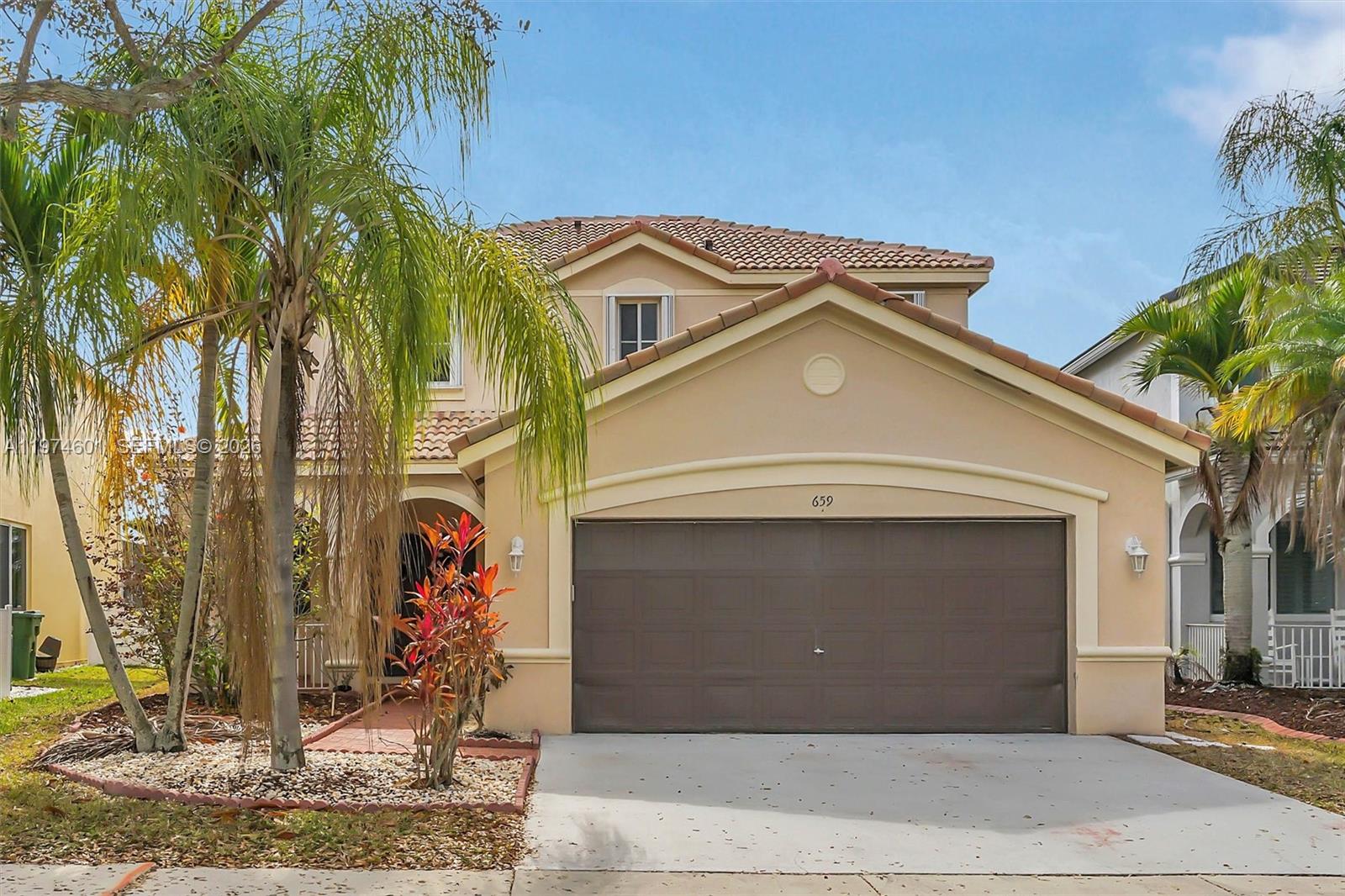 Beautiful lakefront living in a gated Weston community! This well-maintained 4-bedroom, 2.5-bath home features a screened-in patio overlooking serene water views, perfect for relaxing or entertaining. Recently upgraded with brand-new flooring, a fully updated kitchen, all new bathrooms, and freshly painted interiors, this home is truly move-in ready. The primary suite is conveniently located on the first floor, offering both privacy and ease of living.
Enjoy added peace of mind with accordion hurricane shutters and a thoughtfully designed layout that fills you with natural light. Residents have access to fantastic community amenities, including a pool, basketball court, and more, all within a secure gated neighborhood. Located in a highly sought-after area with A+ rated schools, and just minutes from major highways, shopping, and dining.
