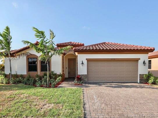 Gorgeous BRAND NEW 4 bedroom, 3 bathroom estate home with a 2 car garage. Enjoy lake views & a beautifully landscaped park. A mixture of luxury & comfort. Home located in Portovita, one of Homestead’s most exclusive communities. Spectacular club house that offers an array of amenities such as a fitness center, social room & a stunning pool. Huge Backyard. New vinyl floors throughout. OPTIC CABLE for maximum high speed internet.  Located near the Baptist Hospital, Homestead Air Base & Turkey Point. Easy access to the turnpike. This home is a MUST SEE! Call for a private showing today. Ease to show.