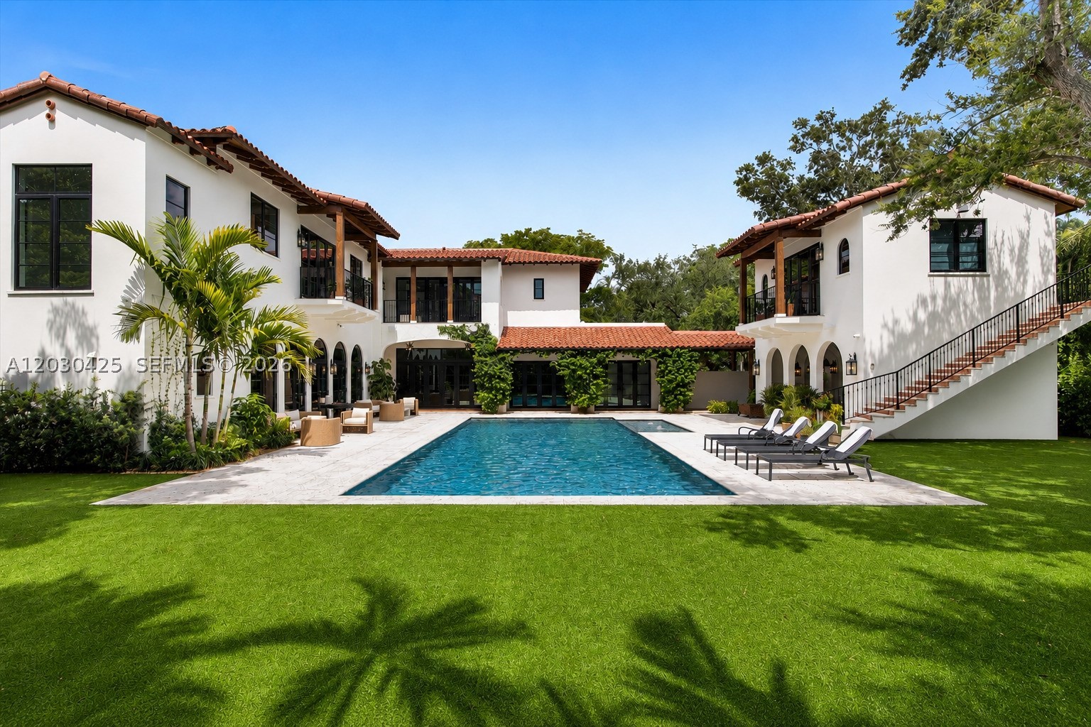 Magnificent custom estate in Coral Gables’ prestigious Riviera neighborhood, where timeless architecture and exceptional craftsmanship define every space. This extraordinary residence features 8 bedrooms 9.5 baths , soaring vaulted ceilings, impact windows and doors, a private elevator, travertine and hardwood flooring, custom millwork, designer lighting, and museum-quality finishes throughout.

Designed for grand entertaining and everyday living, the home offers expansive formal and informal living areas overlooking a resort-style pool. The chef’s kitchen features premium Viking and Miele appliances, double ovens, extensive custom cabinetry, oversized island, and a fully equipped butler’s pantry with wine cooler, dishwasher, sink, and abundant storage.

Additional highlights include staff quarters, laundry rooms upstairs and downstairs 2 large bonus spaces, surround sound, custom built-ins, an air-conditioned 2 car garage, covered terraces, and a expansive summer kitchen . Pool views or garden views from nearly every room complete this exceptional residence in one of Coral Gables’ most coveted neighborhoods.