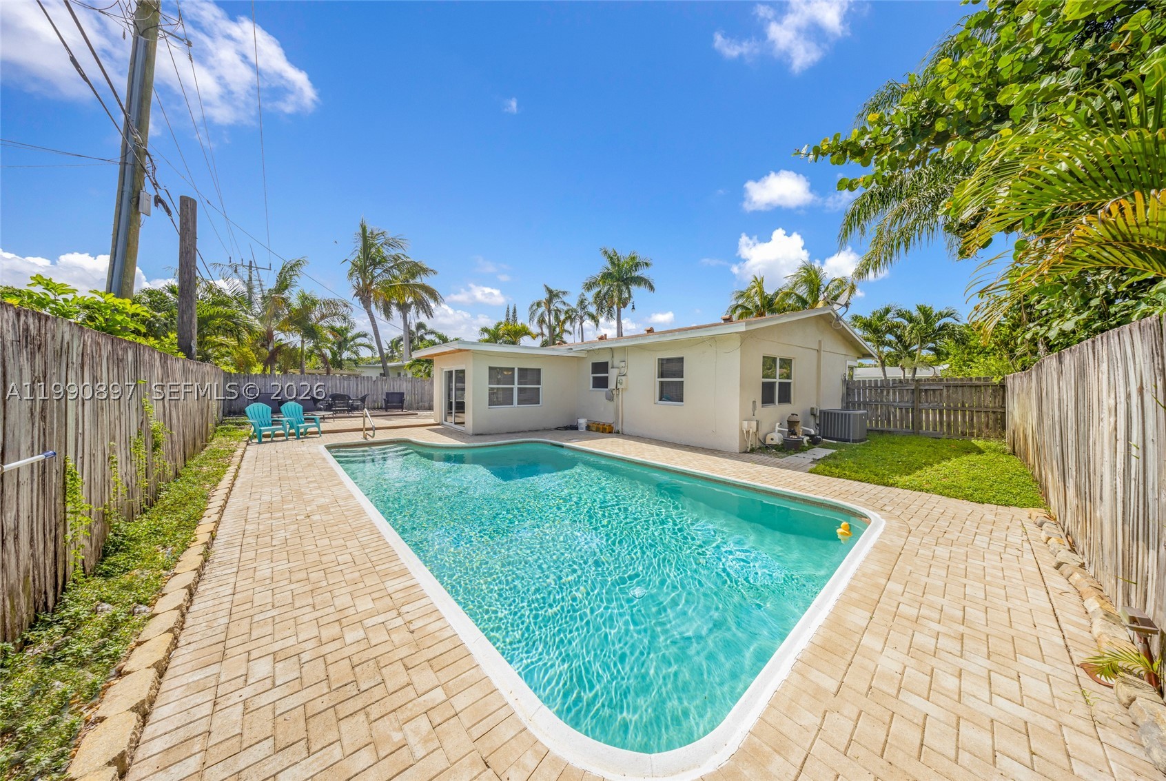 Beautifully renovated and furnished pool home- ready for new owners to move-in! Square footage is 1,512 interior space. Open-concept kitchen with stainless steel appliances, granite countertops, and breakfast counter. Spacious living room is open to kitchen area - great for entertaining. This desirable split-bedroom floorplan has a large master suite with walk-in closet and ensuite bathroom. Additional features include: large in-ground pool and rear deck, impact windows, interior laundry, circular paved driveway, roof in 2017, air conditioner in 2017, newer pool motor 6 months ago, exterior stucco finish & paint 6 years ago, exterior wood trim/lighting 2 years ago, tankless water heater about 2 years. Great east location, just 2 blocks west of Federal Highway, minutes to the beach, & close to stores, restaurants, golf, tennis, boating & more.  Buyer must sign FIRPTA Addendum (for Foreign Seller). Listing is subject to errors, changes, & omissions without notice, information in this listing is not warranted or guaranteed & must be confirmed by Buyer.