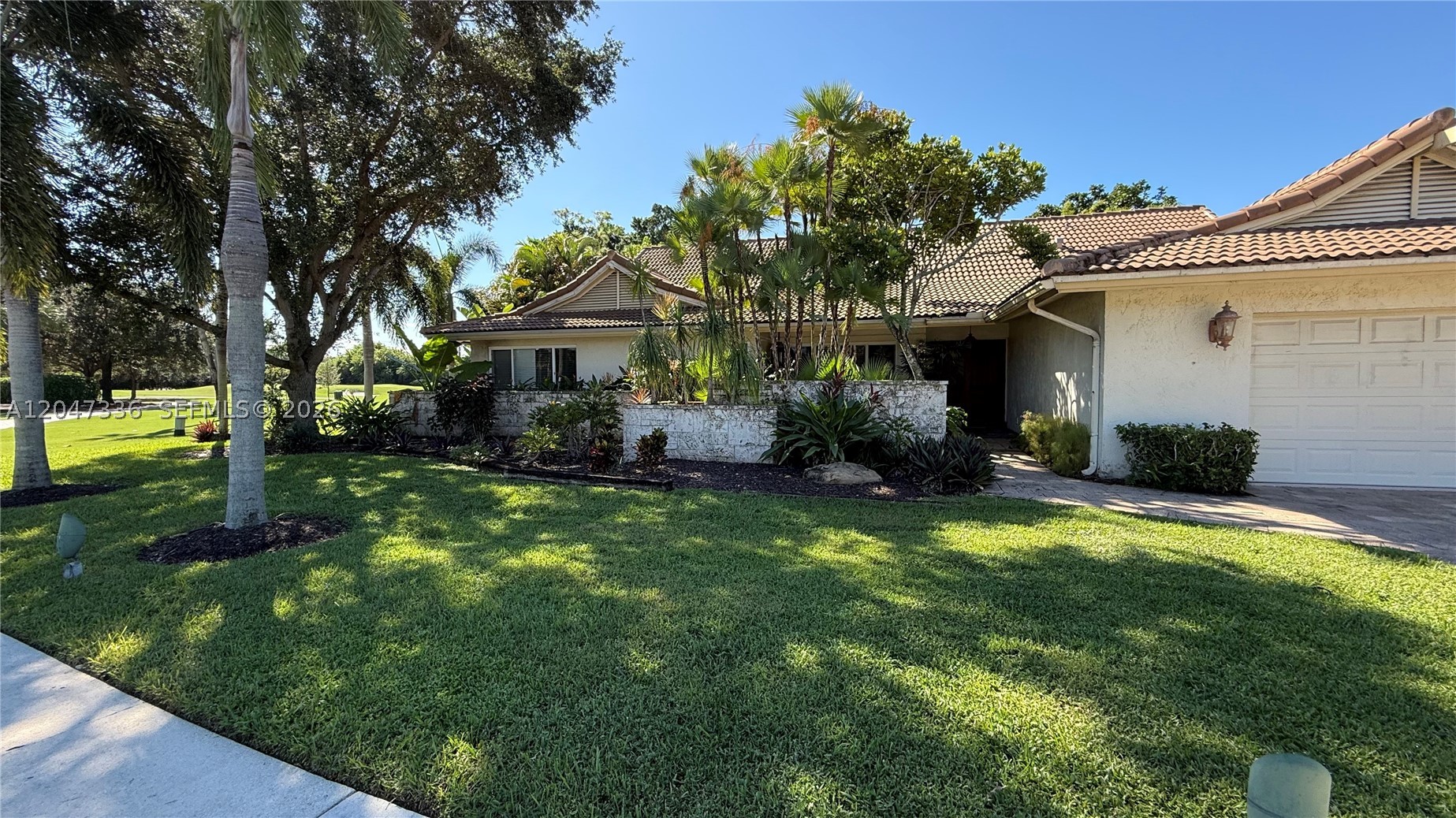 Beautifully unfurnished single-family home with tranquil golf course views in the prestigious, 24-hour guard-gated Boca Woods Country Club. Situated on a desirable corner lot with no neighbor on one side, this home offers added privacy and an open, spacious feel. Features an open floor plan with new flooring in the main living areas, an open kitchen with wood cabinetry, granite countertops, stainless-steel appliances, and impact windows throughout. Enjoy a private fenced backyard with a pool and spacious patio overlooking the golf course—perfect for relaxing or entertaining.

Boca Woods offers a beautifully maintained residential setting with tree-lined streets, lush landscaping, and 24-hour gated security, creating a peaceful and welcoming environment. Ideally located in West Boca Raton, just minutes from fine dining, shopping, grocery stores, top-rated hospitals, A-rated schools, parks, entertainment, major highways, and Boca Raton's beautiful beaches.

Basic cable and internet included. Unfurnished. No club membership or access to Boca Woods Country Club amenities. First month's rent and two months' security deposit required. Easy to show.