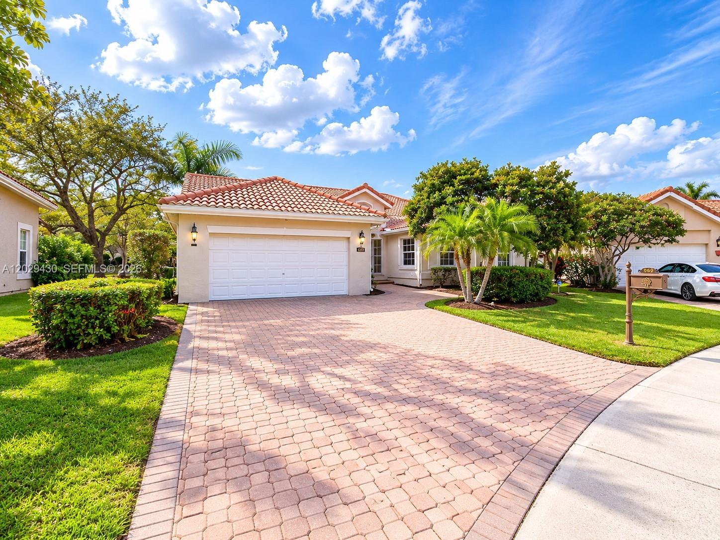 Welcome to Laguna Springs, one of Weston’s most charming gated communities. Nestled on a quiet street, this beautifully lakefront pool home sits on a pie shape lot and offers the perfect blend of privacy, comfort, and SFL living.  Featuring a bright open floor plan with soaring vaulted ceilings and abundant natural light, this home is designed for both everyday living & entertaining. The spacious living and dining areas flow seamlessly into the kitchen and family spaces, creating an inviting atmosphere throughout. Large windows & sliding glass doors showcase tranquil lake views & provide direct access to the pool area, where you can relax, entertain guests, or enjoy peaceful waterfront sunsets from your own backyard.  The split-bedroom layout offers privacy for family & guests, while the generous primary suite features a spacious bath, soaking tub, separate shower, & ample closet space. Tile flooring in the main living areas & wood flooring in the bedrooms. Laguna Springs is a boutique gated community known for its quiet streets, low traffic, and welcoming neighborhood atmosphere. across from Weston’s top-rated schools, beautiful parks, walking and biking trails, golf courses, shopping, dining, and easy access to major highways. Weston consistently ranks among the most desirable cities in SFL for its exceptional quality of life, lush landscaping, and family-friendly environment. This lakefront pool home offers the opportunity to enjoy the best of the Weston lifestyle.