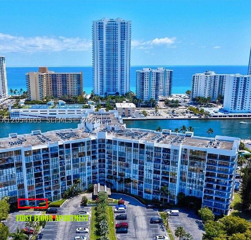 Large 2 bedroom + 2 full bathrooms apartment. Ground floor apartment with private entrance through balcony/terrace. Floor to Ceiling Windows. Walk-in closet. Walk to pool area to enjoy views of Intracoastal. Building completed 40 years certification. Association has reserves. Water, Internet & Cable TV included in the maintenance. 24 hours Services of Reception and Security. Guests Parking spaces available. Large heated swimming pool, professional gym, sauna, 2 tennis courts, BBQ area, billiard, ping-pong, bicycle room for storage. Beach access within 5 minutes driving, close to Hollywood Boardwalk, shopping plazas, restaurants and more. For Showings please call or text Listing Agent.