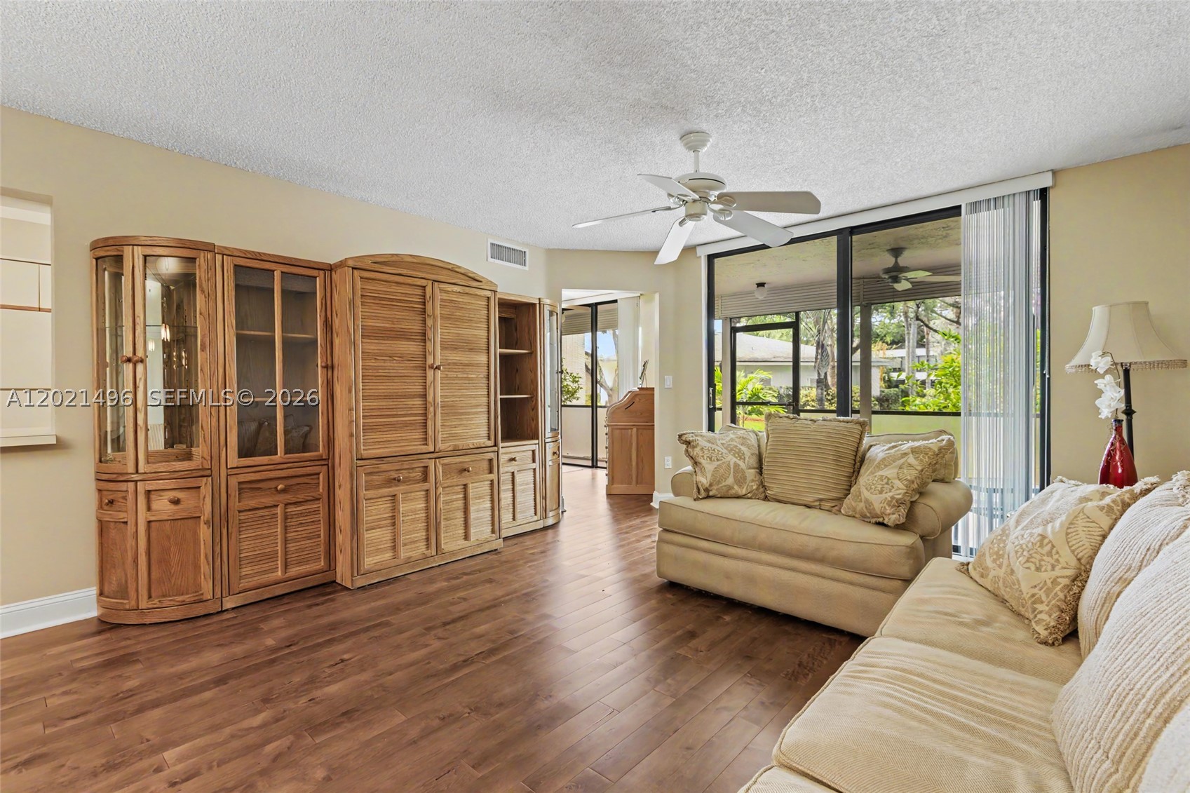 Sheridan By The Beach is a gated community offering a first-floor residence featuring two bedrooms and two bathrooms, encompassing 1,300 square feet. This unit boasts oversized closets and engineered hardwood floors, complemented by a serene garden view, Enjoy easy access to the pool and clubhouse directly from the unit’s terrace. Recent upgrades include a 2024 air conditioner, a 2025 hot water heater, a new impact front door, and roll-down shutters on the screened-in balcony. The convenience of an in-unit washer and dryer is also provided. Internet included in the amenities. The community offers two heated swimming pools, two clubhouses, a gym, BBQ areas, and tennis/pickleball courts. Both the Milestone Inspection and SIRS have been completed, ensuring no special assessments. The property is conveniently located near Hollywood Beach and Broadwalk.